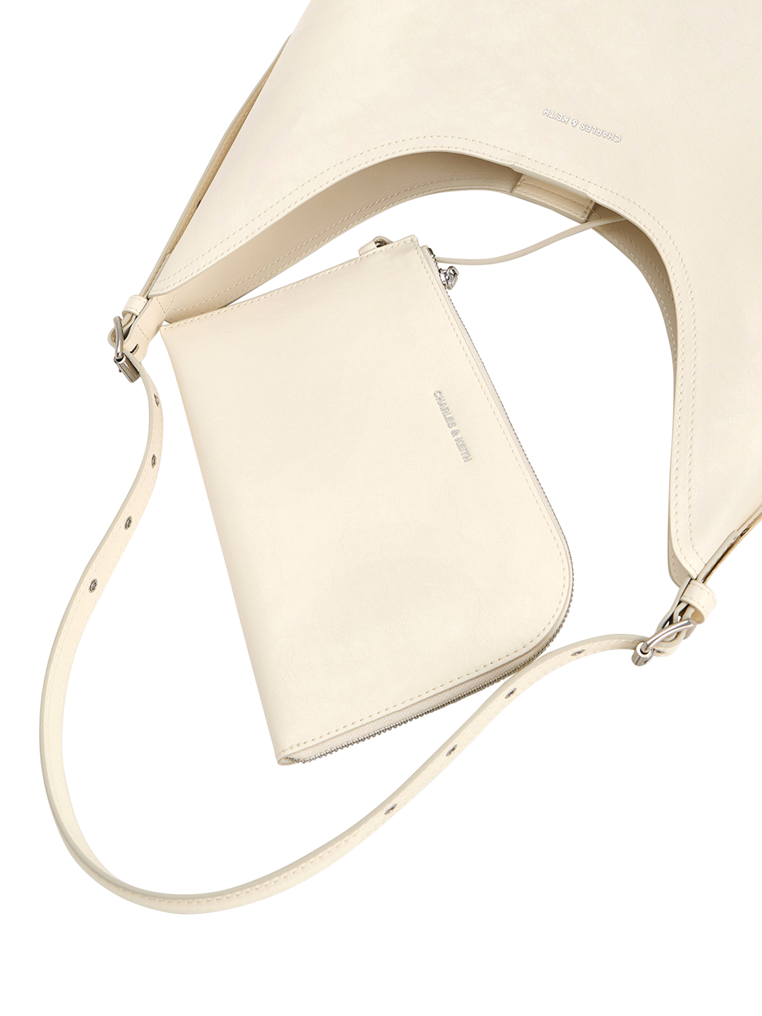 Product image 4 of 4, which shows CHARLES & KEITH Liv Grommet Embellished Hobo Bag, Cream