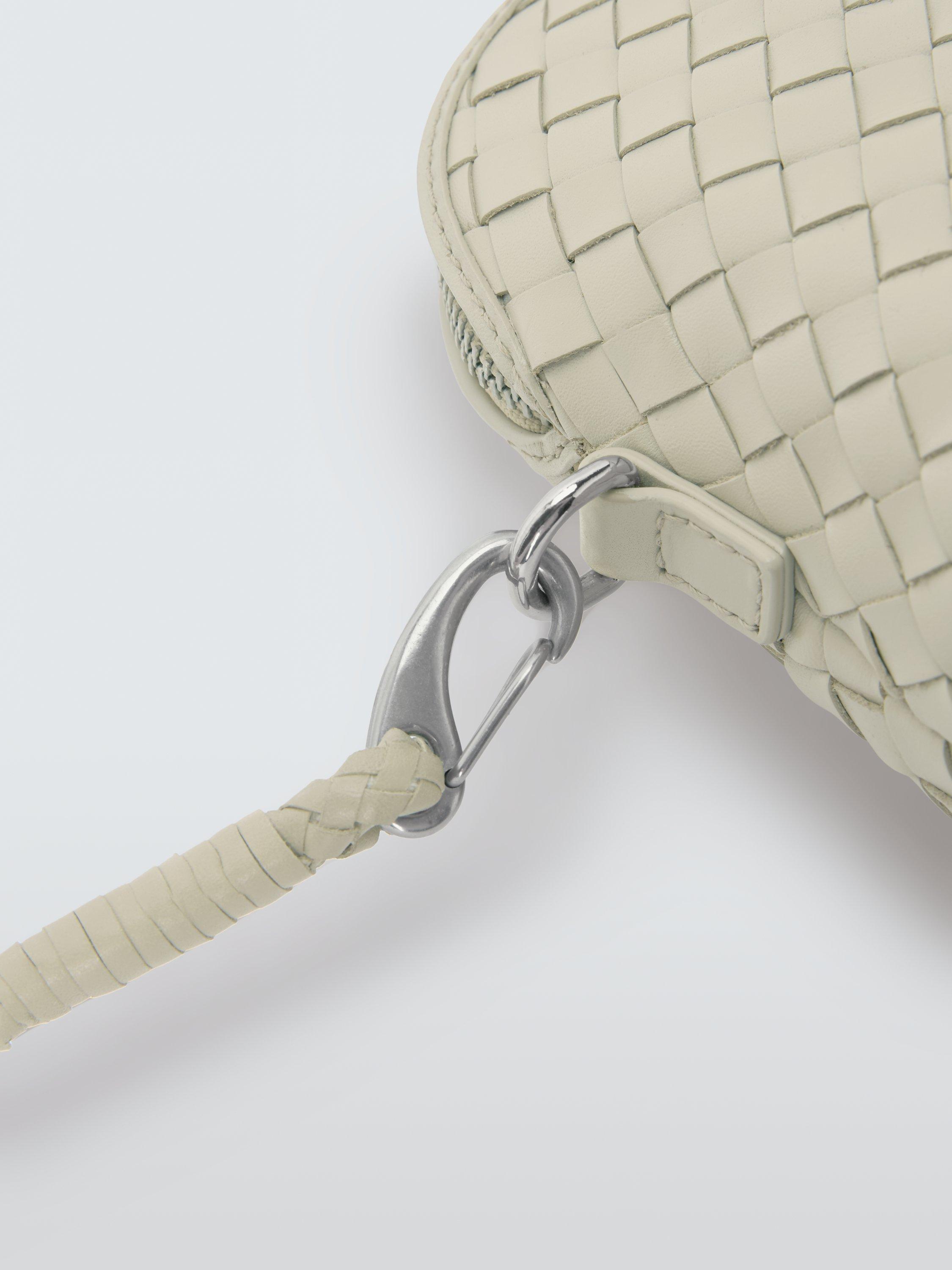 Product image 6 of 6, which shows Dragon Diffusion Chunky Fellini Pochette Woven Leather Cross Body Bag, White