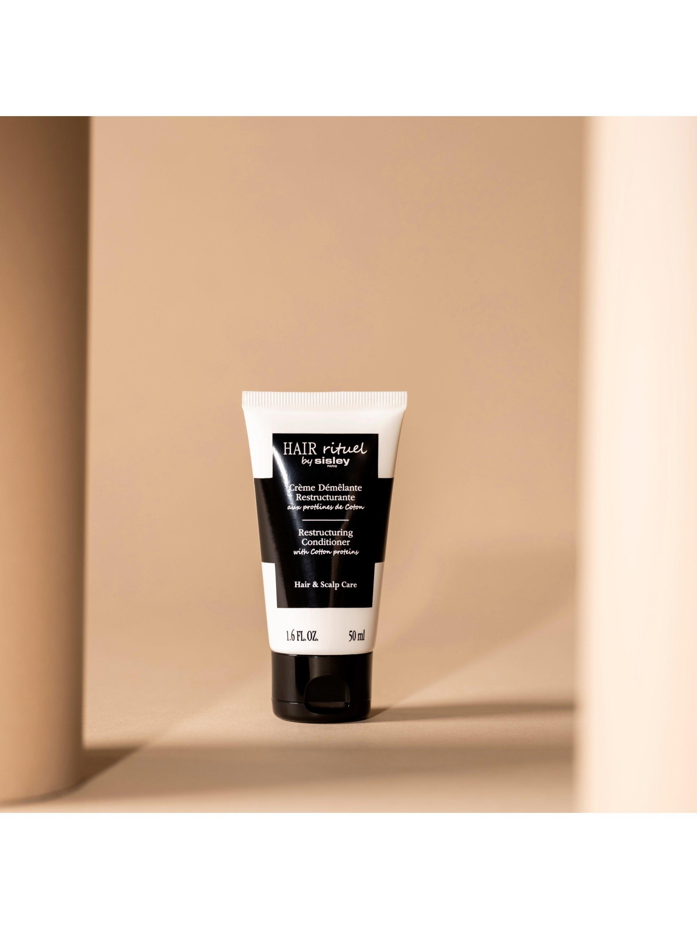 Product image 2 of 3, which shows Sisley-Paris Hair Rituel Restructuring Conditioner with Cotton Proteins Travel Size, 50ml