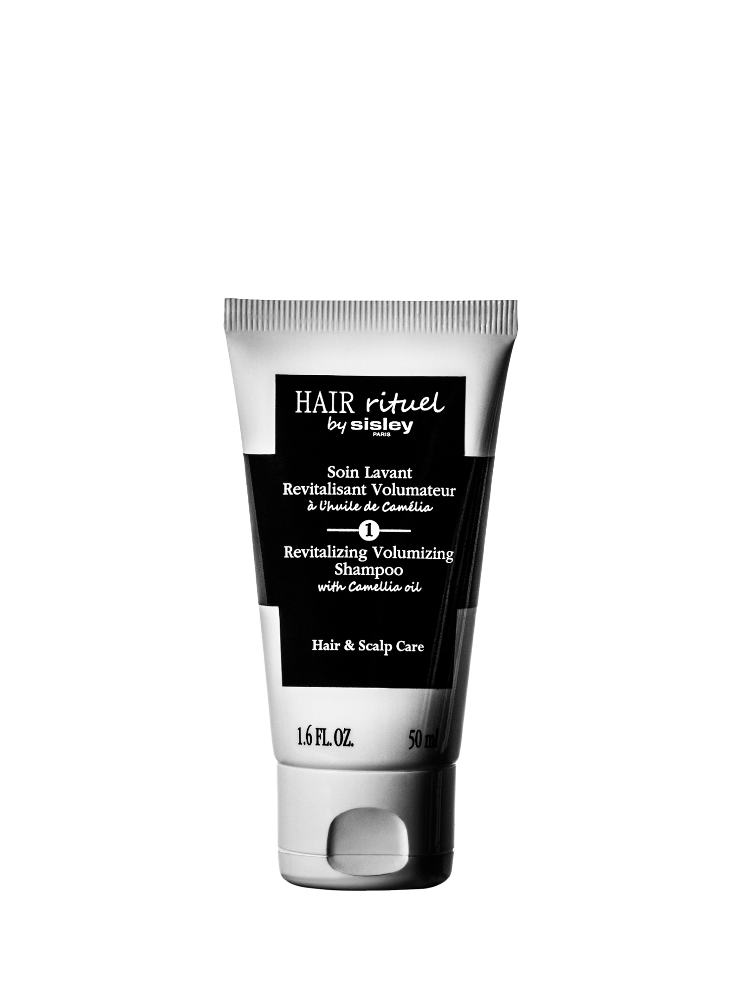 Product image 2 of 3, which shows Sisley-Paris Revitalising Volumising Shampoo with Camellia Oil Travel Size, 50ml
