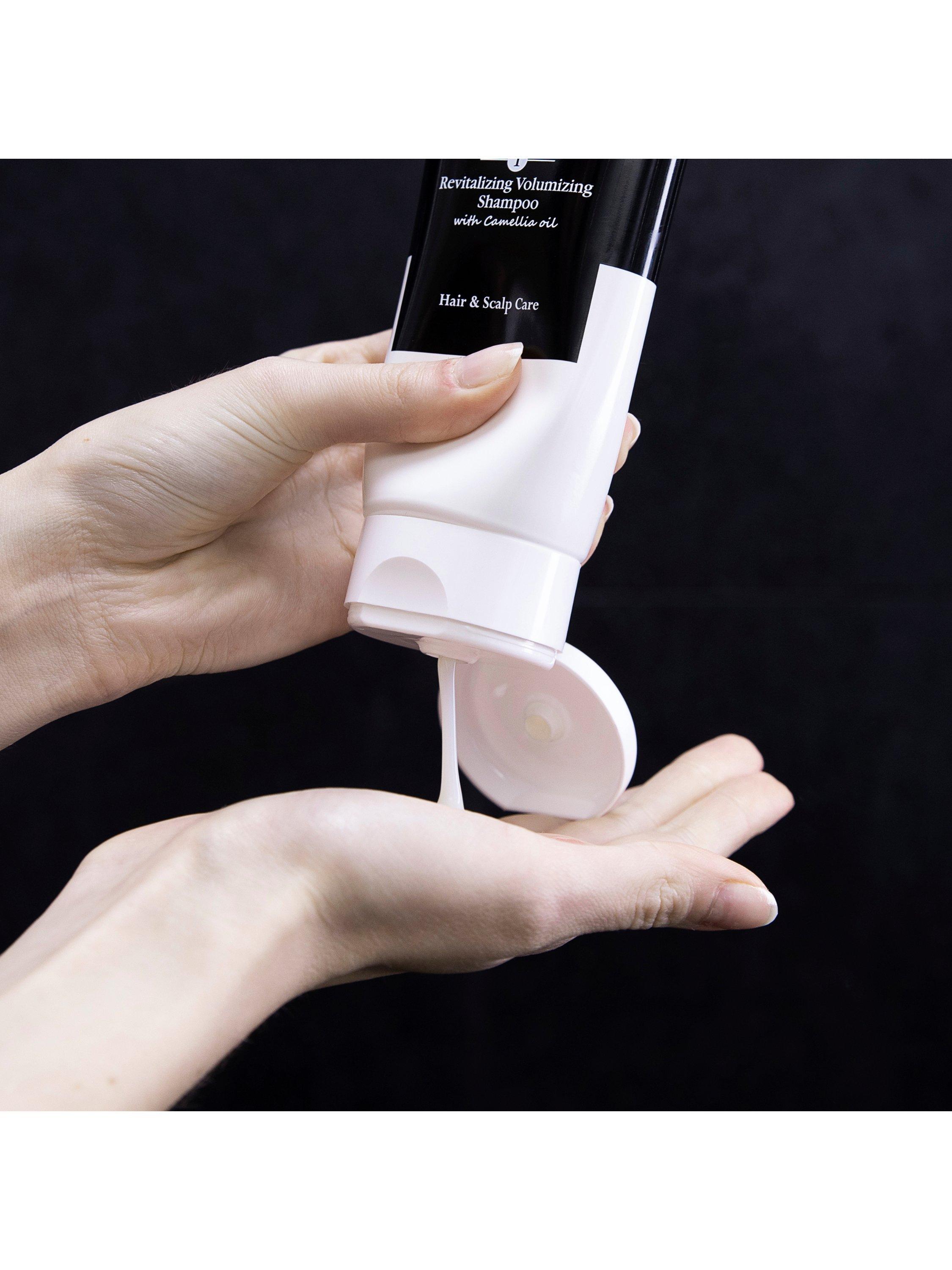 Product image 3 of 3, which shows Sisley-Paris Revitalising Volumising Shampoo with Camellia Oil Travel Size, 50ml