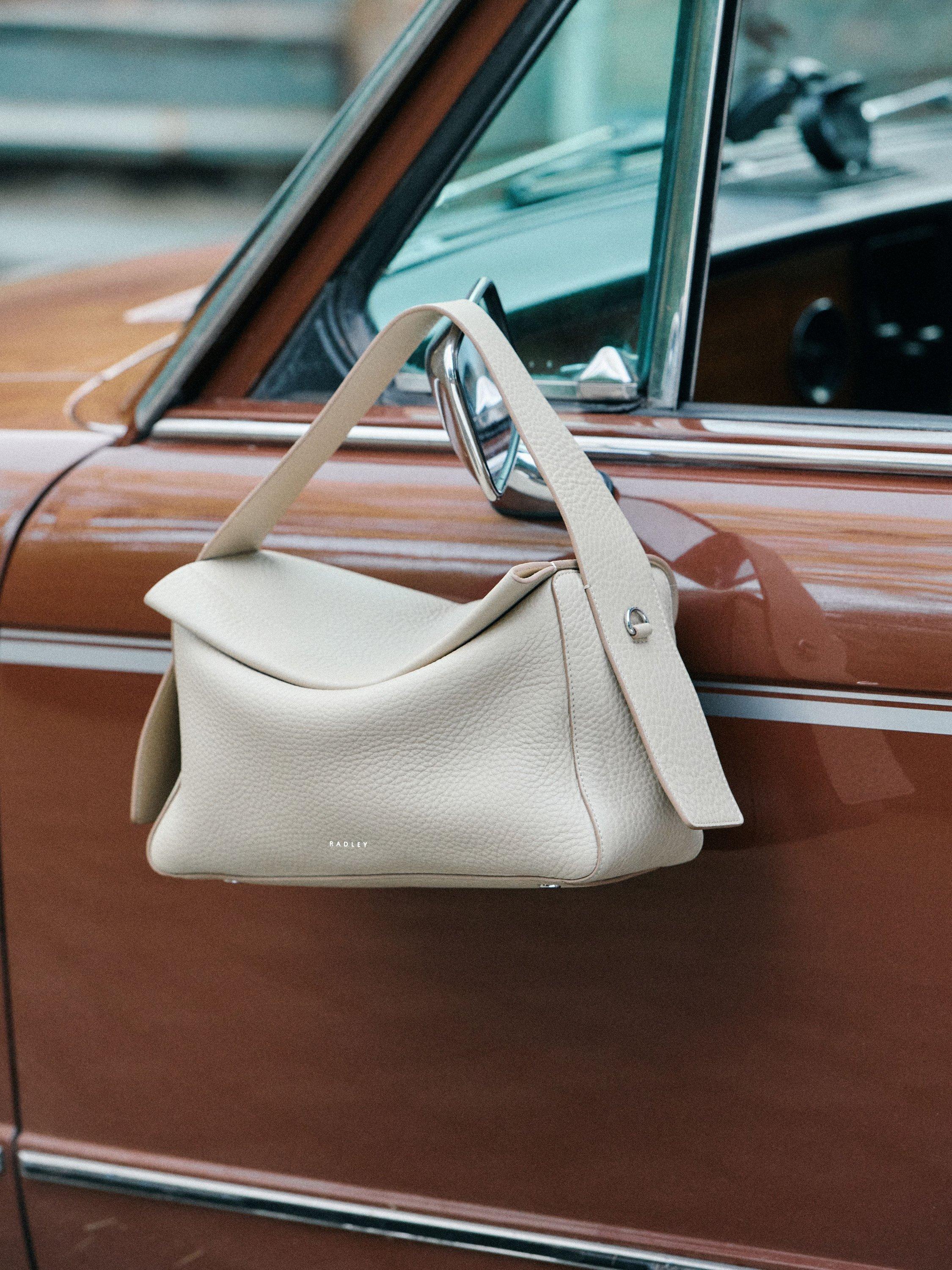 Product image 9 of 9, which shows Radley De Beauvoir Leather Medium Zip Top Grab Bag, Stone