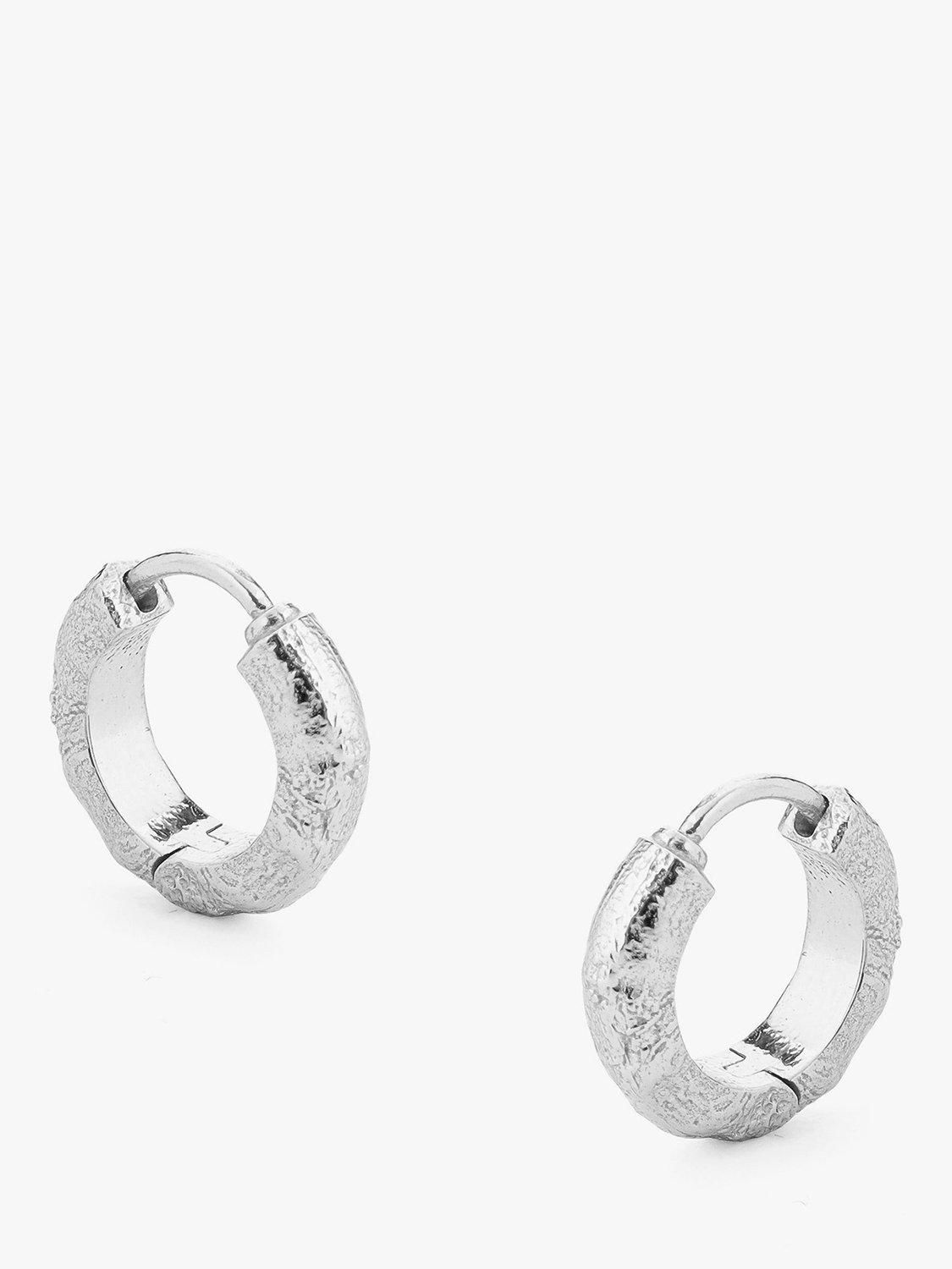 Product image 1 of 3, which shows Tutti & Co Moor Textured Huggie Hoop Earrings, Silver