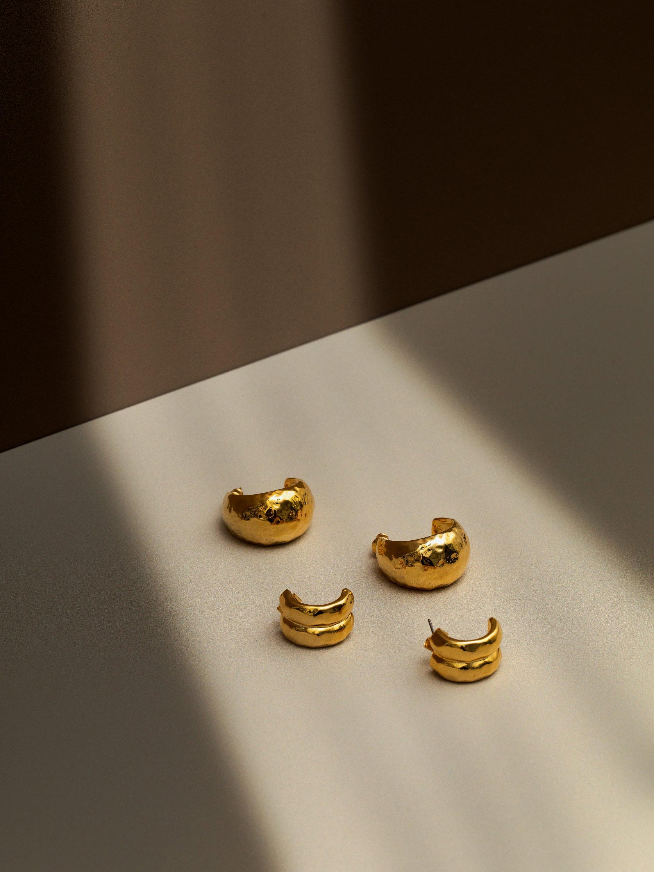 Product image 2 of 2, which shows Orelia Polished Hammered Domed Hoop Earrings, Gold