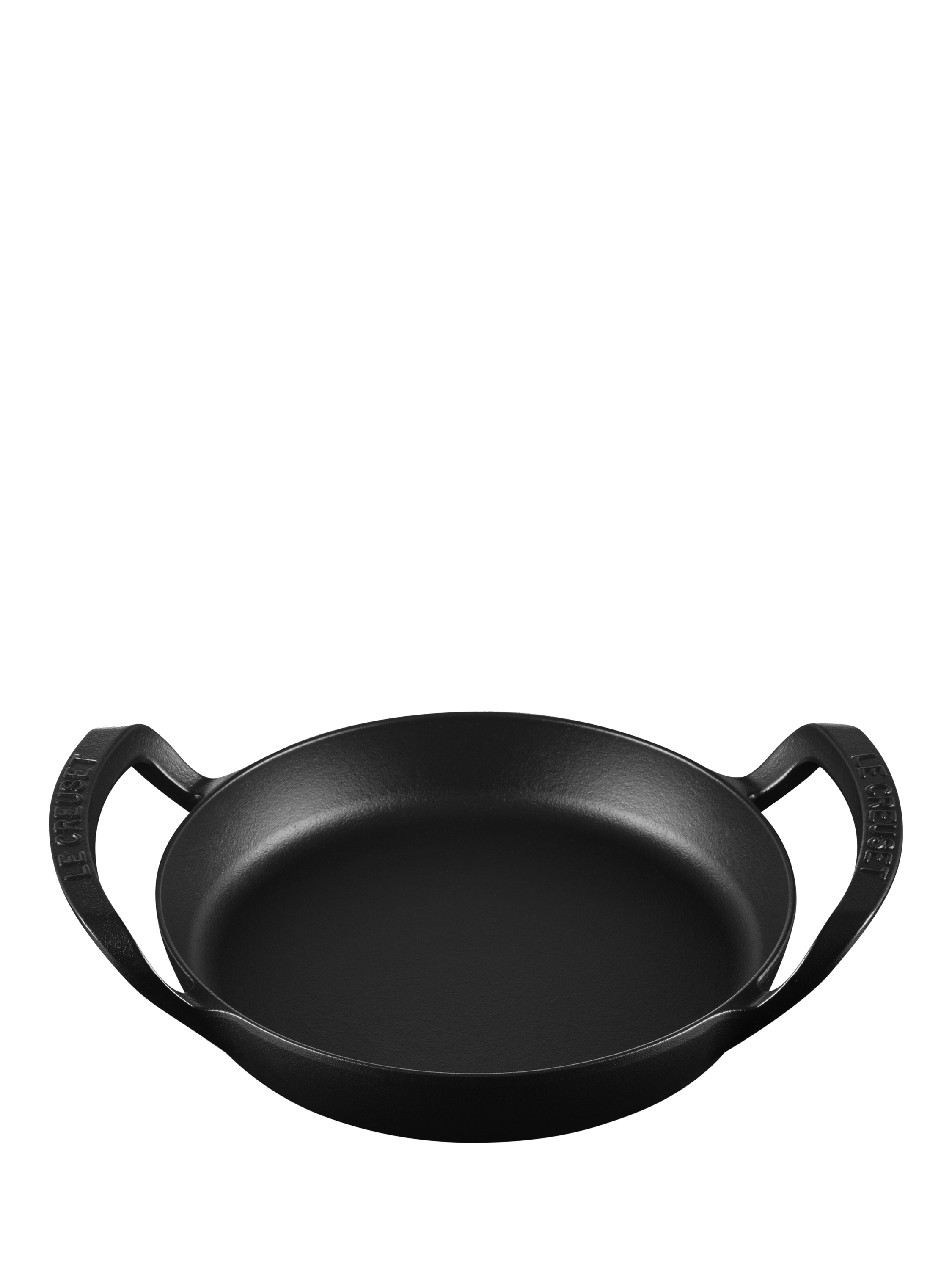 image of a Le Creuset Outdoor Cast Iron Round Skillet in black on a plain grey background