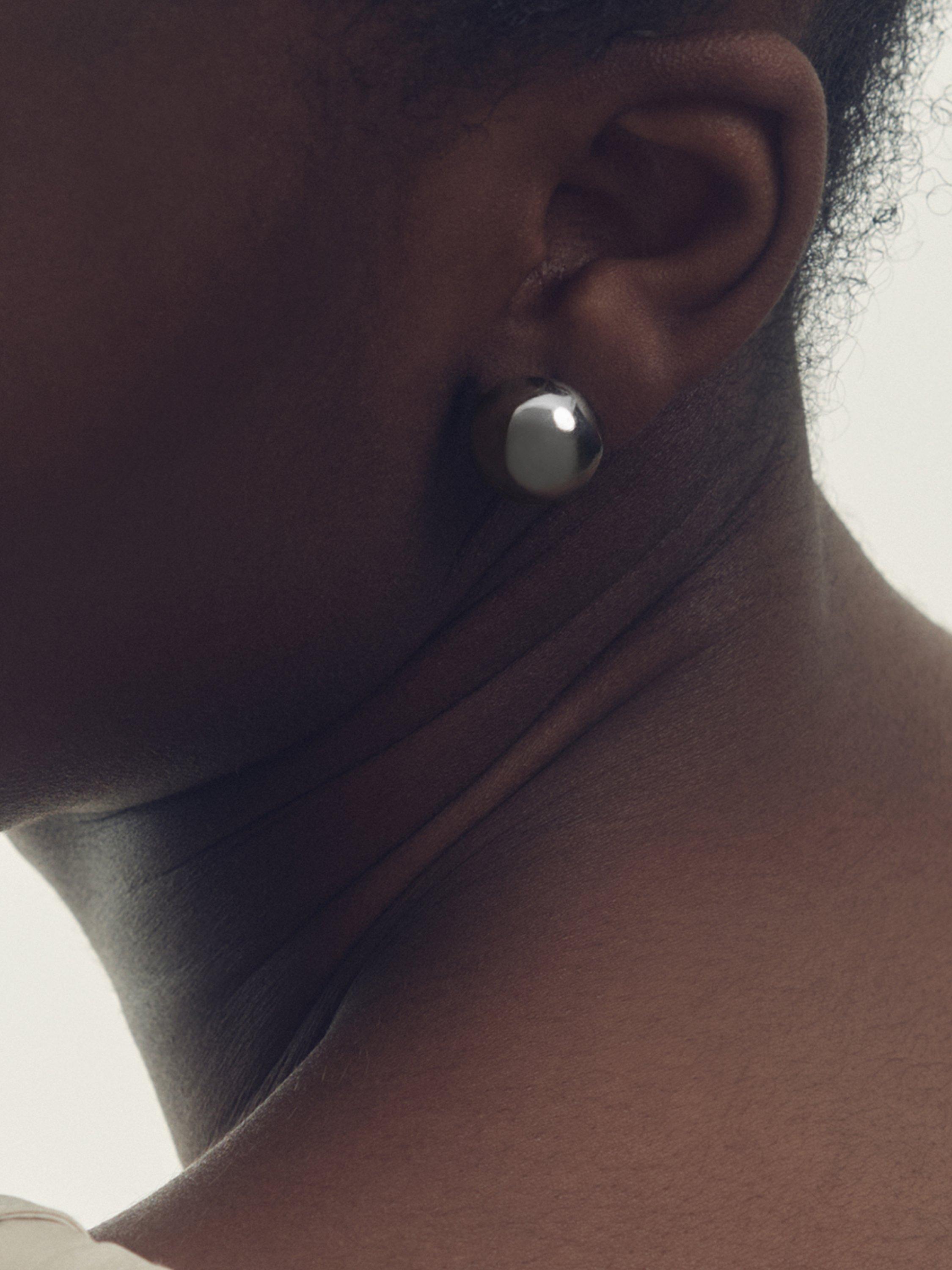 Product image 2 of 6, which shows Reiss Pollie Polished Ball Huggie Hoop Earrings, Silver