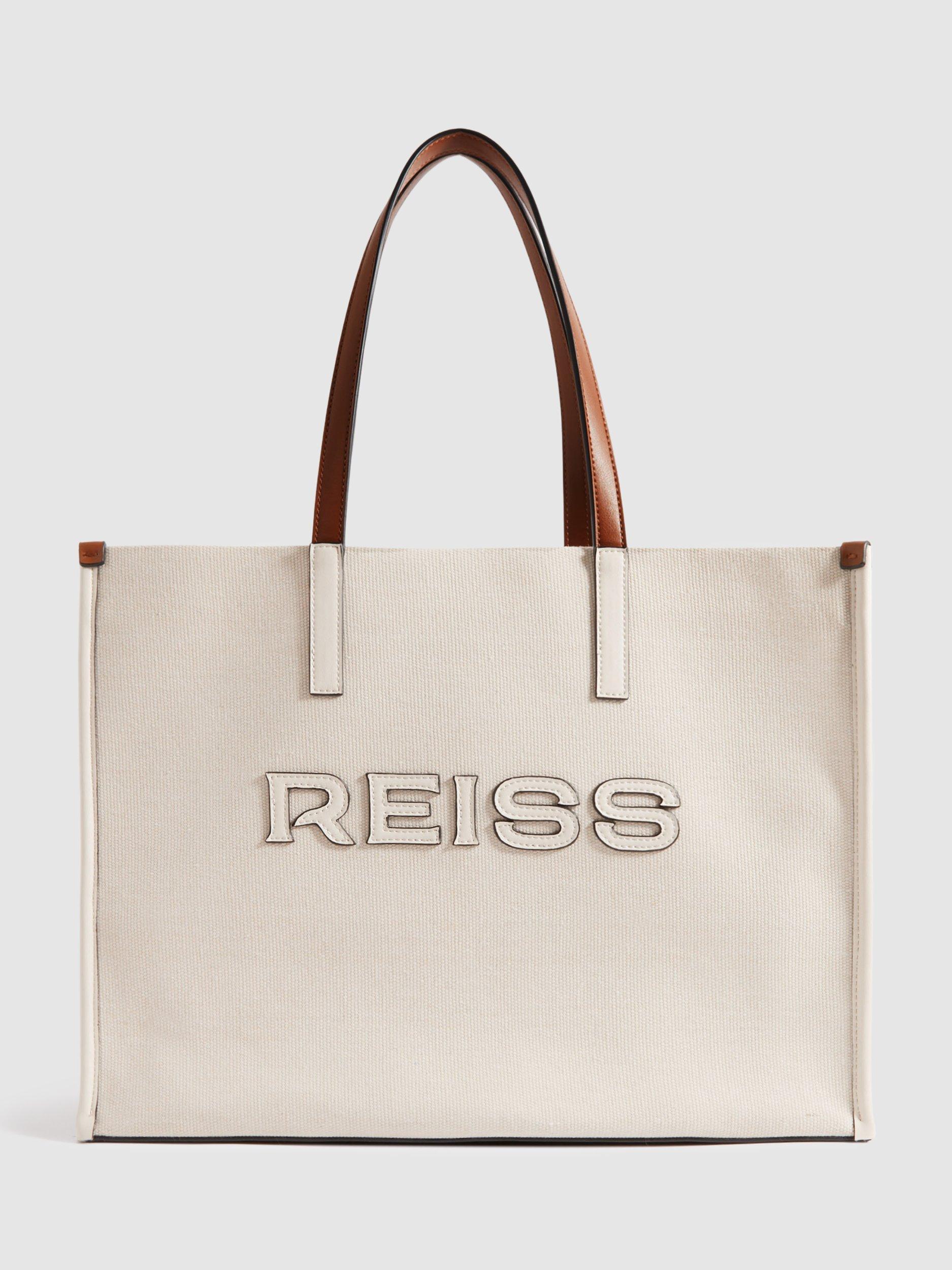 Product image 1 of 5, which shows Reiss Lola Canvas Tote Bag, Cream