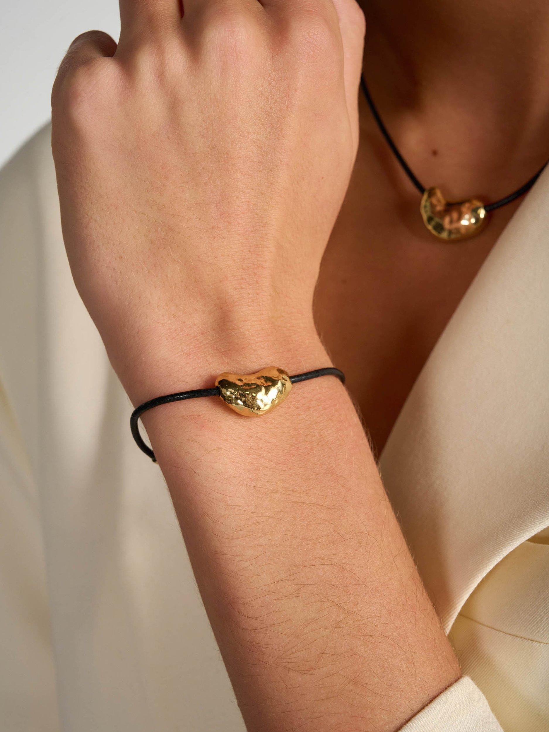 Product image 2 of 5, which shows Tutti & Co Soul Collection Pillow Heart Leather Bracelet, Gold
