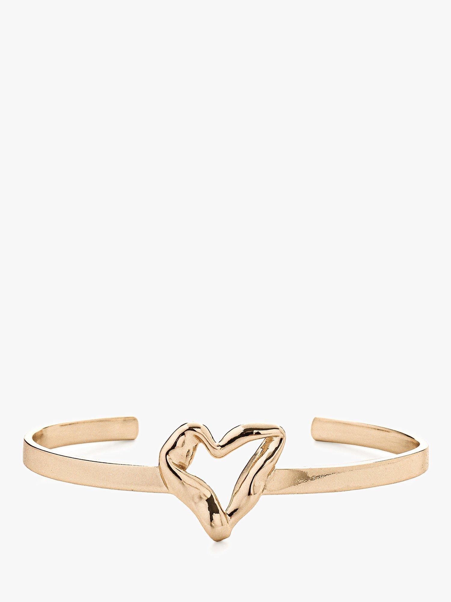 Product image 1 of 5, which shows Tutti & Co Moment Twisted Heart Bangle, Gold