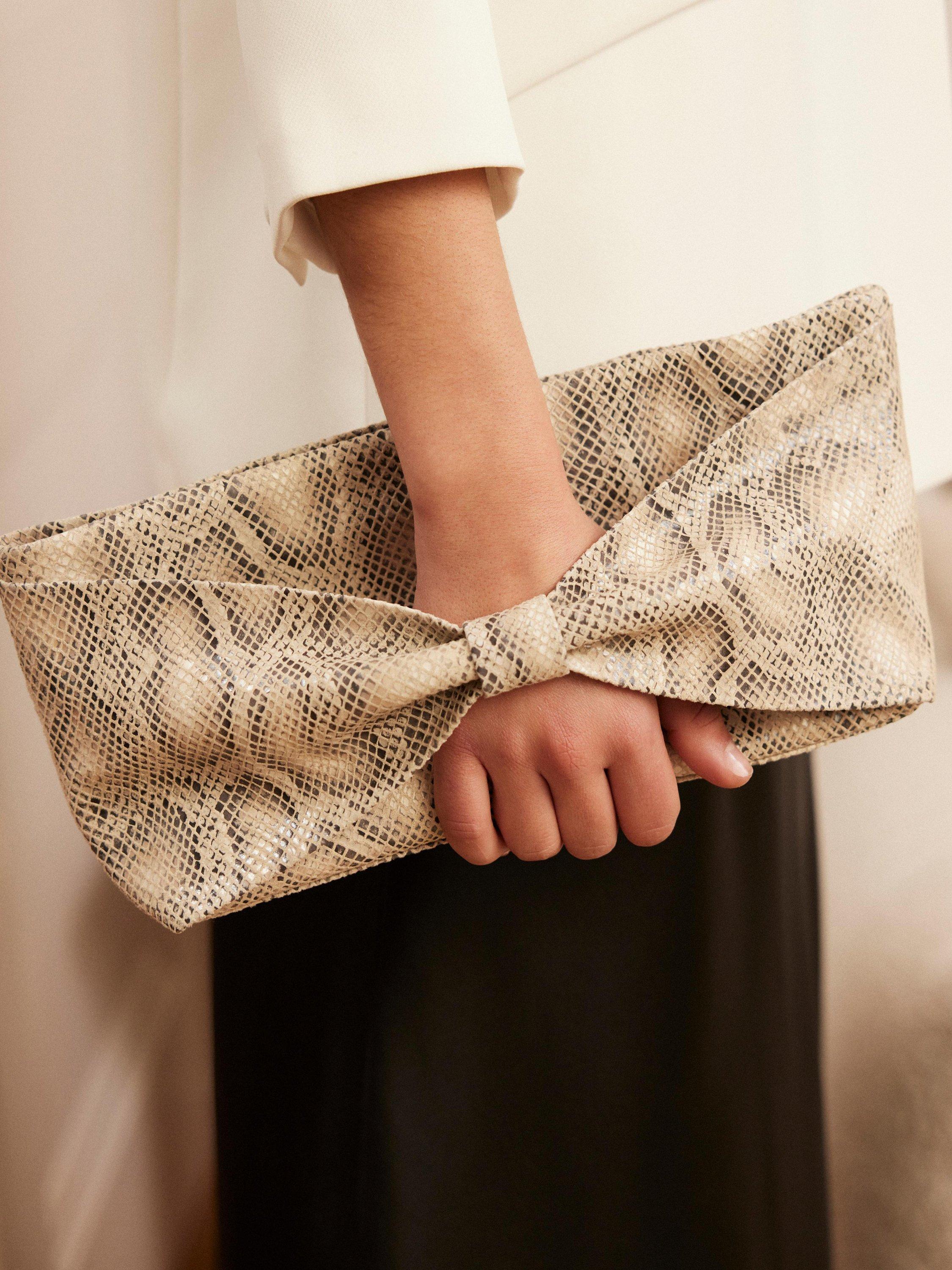 Product image 2 of 5, which shows Mint Velvet Snake Print Leather Clutch Bag, Cream