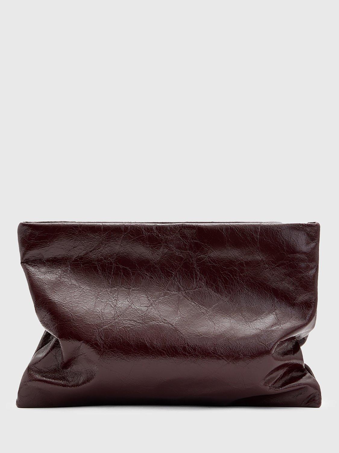 Product image 1 of 6, which shows AllSaints Bettina Leather Clutch Bag, Dark Red