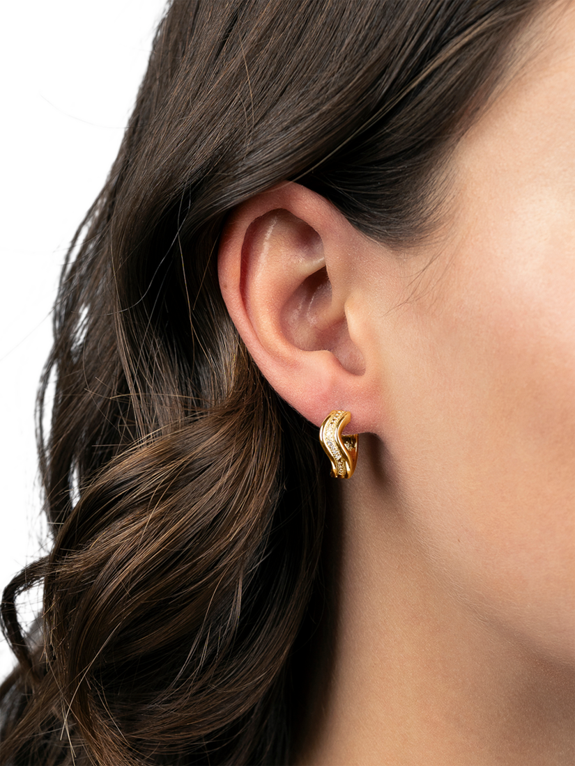 Product image 2 of 3, which shows DPT Flowing Band Huggie Earrings, Gold
