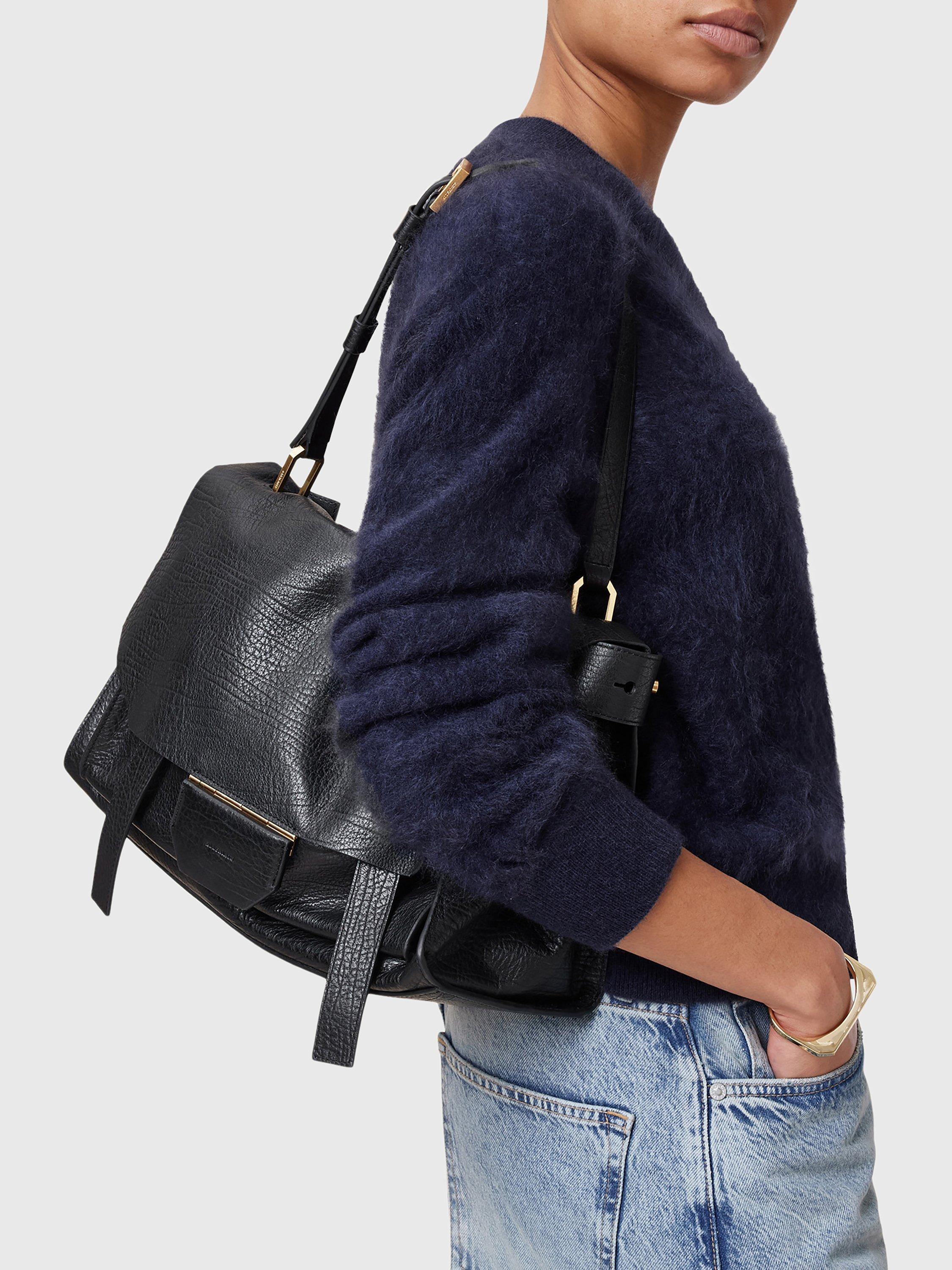 Product image 6 of 9, which shows AllSaints Ursa Grain Leather Satchel Bag, Black Black