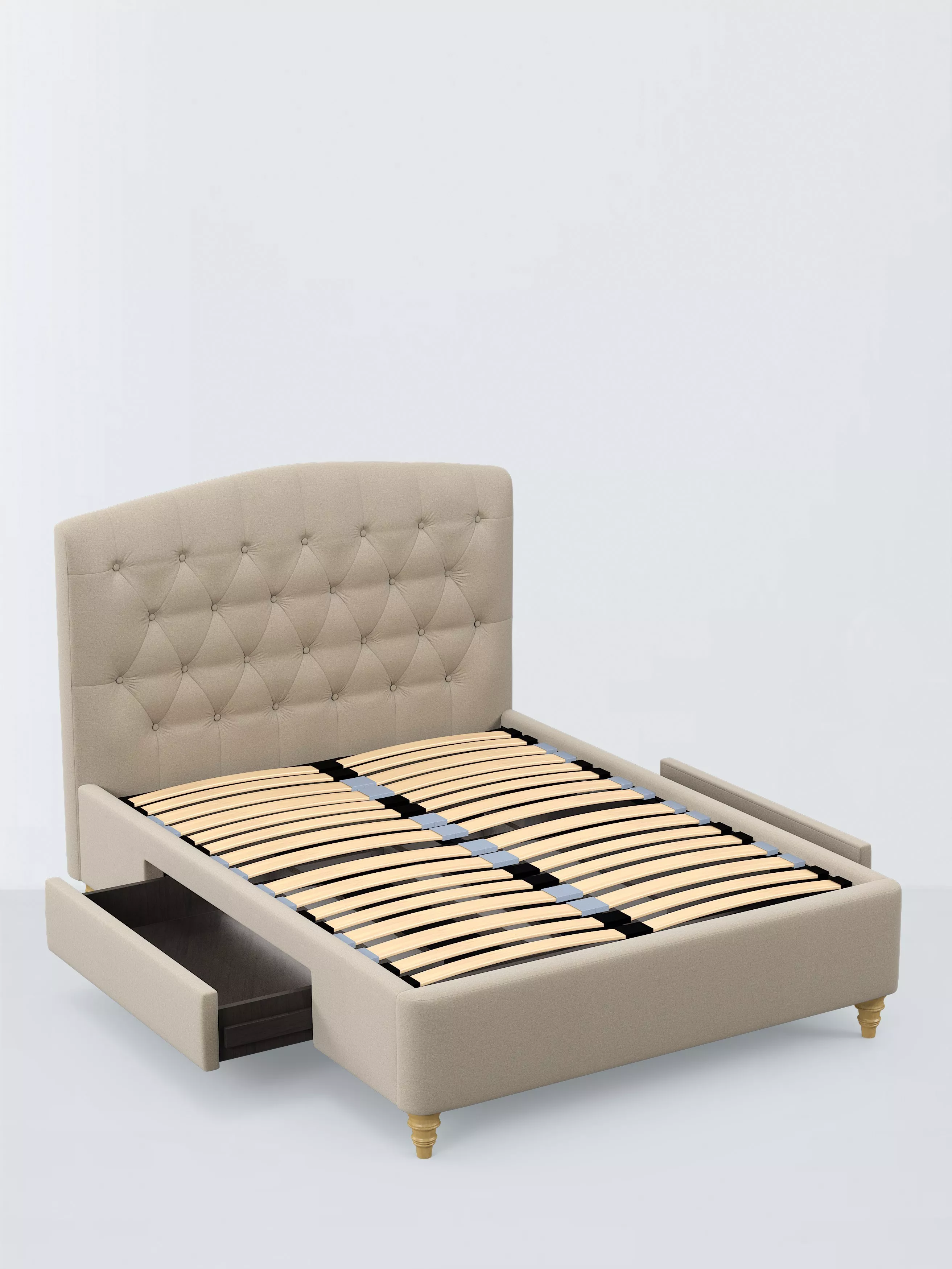 Beige upholstered double bed frame with tufted headboard, wooden slats and pull-out storage drawer in bedroom.