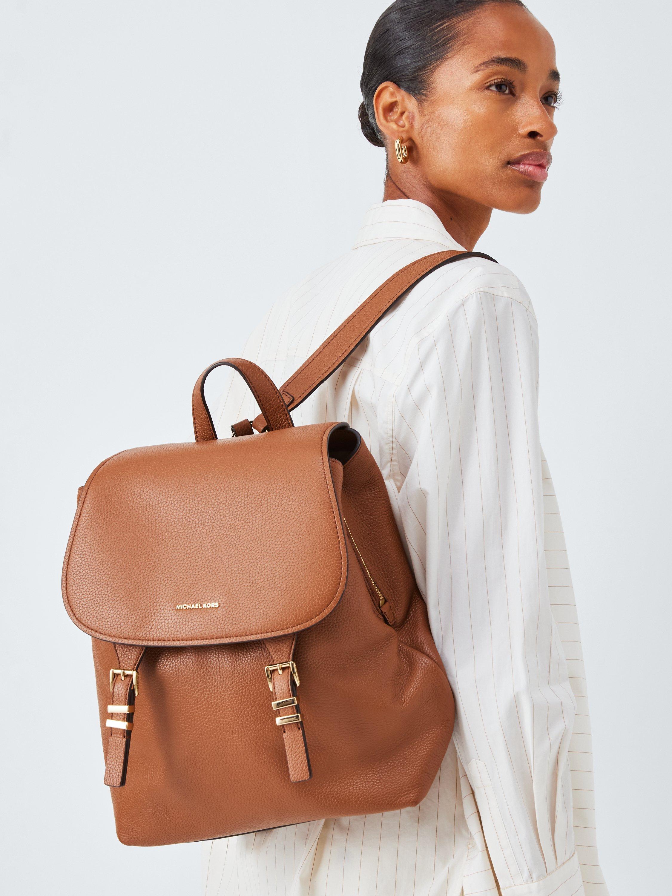 Product image 2 of 6, which shows Michael Kors Quinn Leather Luggage Backpack, Camel