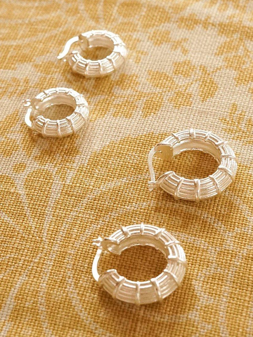 Product image 3 of 5, which shows Daisy London Textured Hoop Earrings, Silver