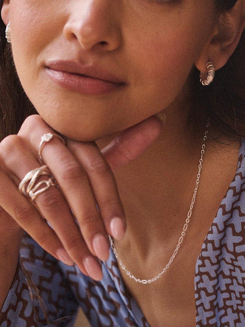 Product image 4 of 5, which shows Daisy London Textured Hoop Earrings, Silver