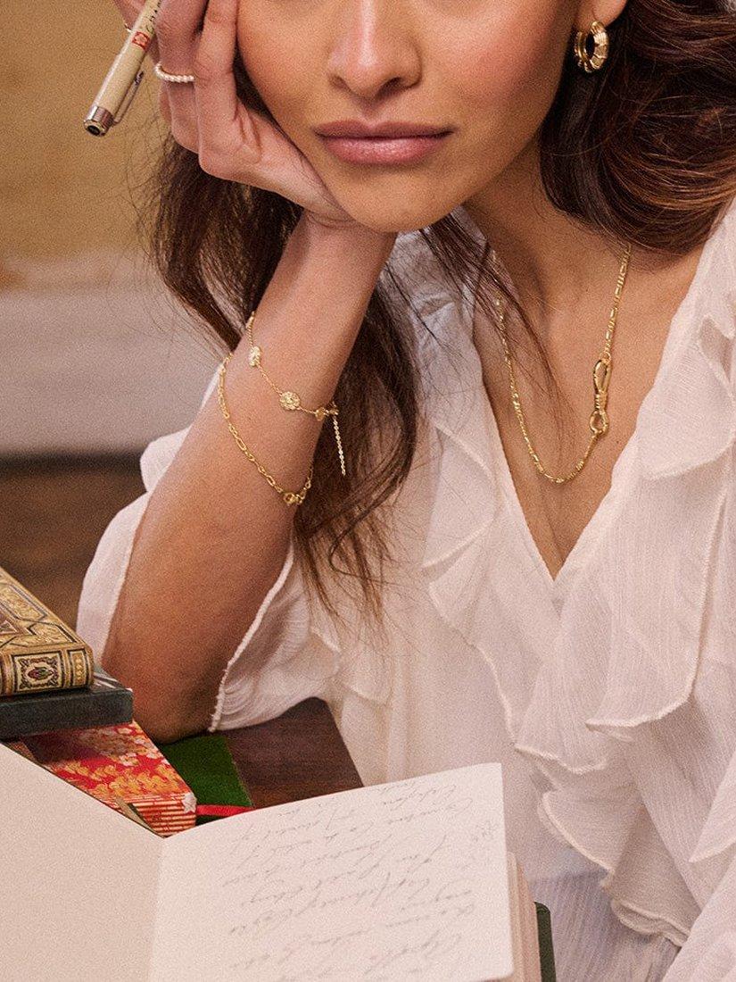Product image 4 of 5, which shows Daisy London Apollo Textured Hoop Earrings, Gold