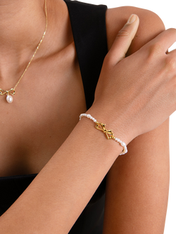 Edge of Ember Bow Pearl Bracelet, Gold - view 2, Yellow Gold