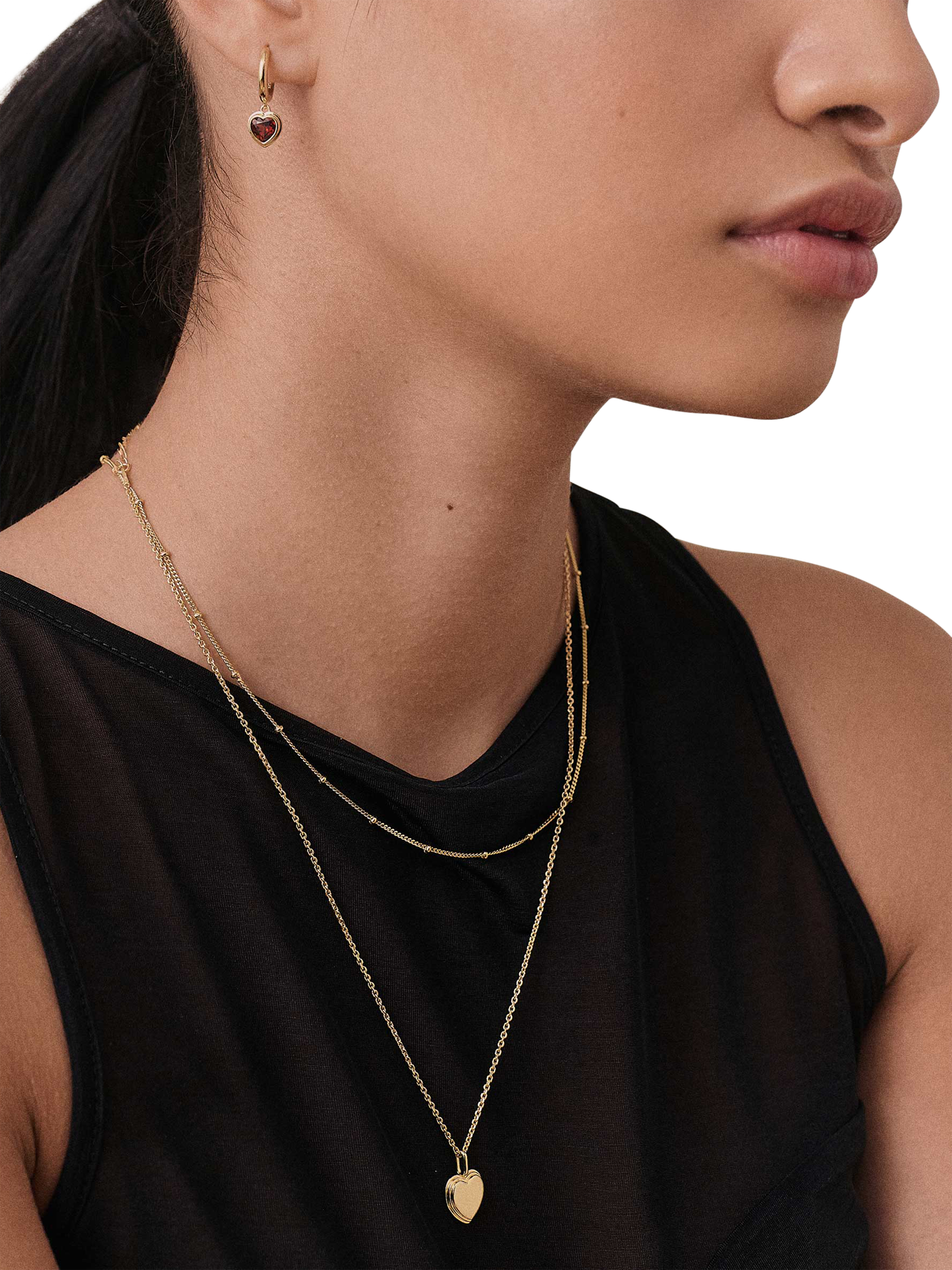 Product image 4 of 5, which shows Edge of Ember Garnet Heart Hoop Earrings, Gold