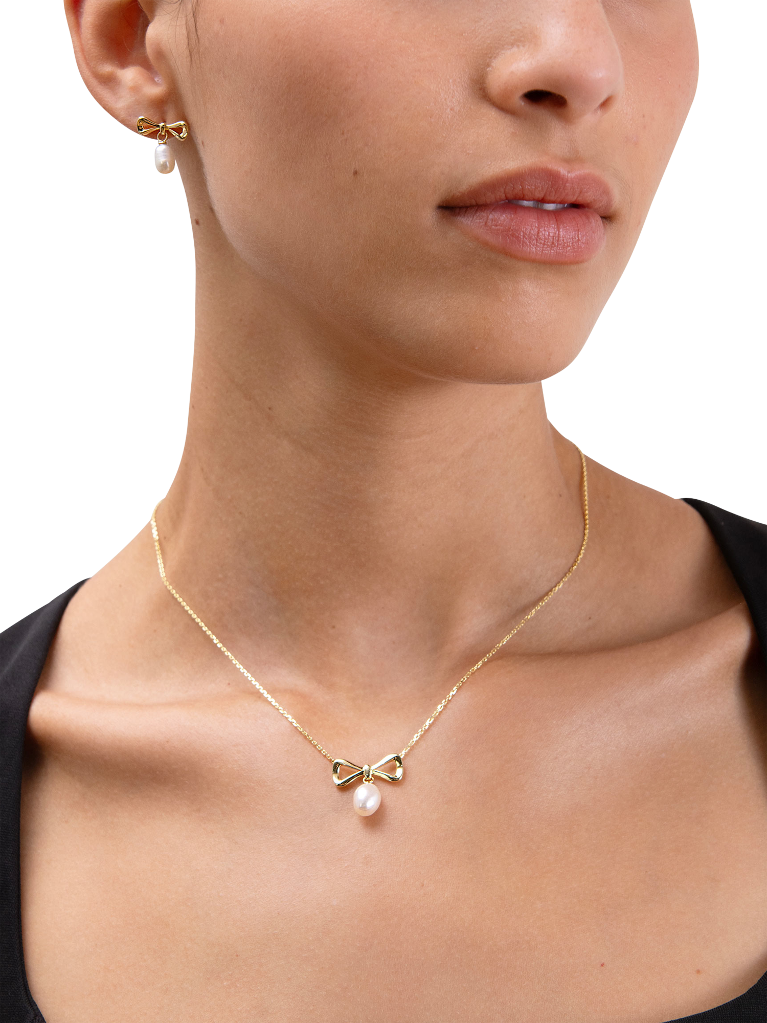 Product image 4 of 6, which shows Edge of Ember Bow Pearl Stud Drop Earrings, Gold