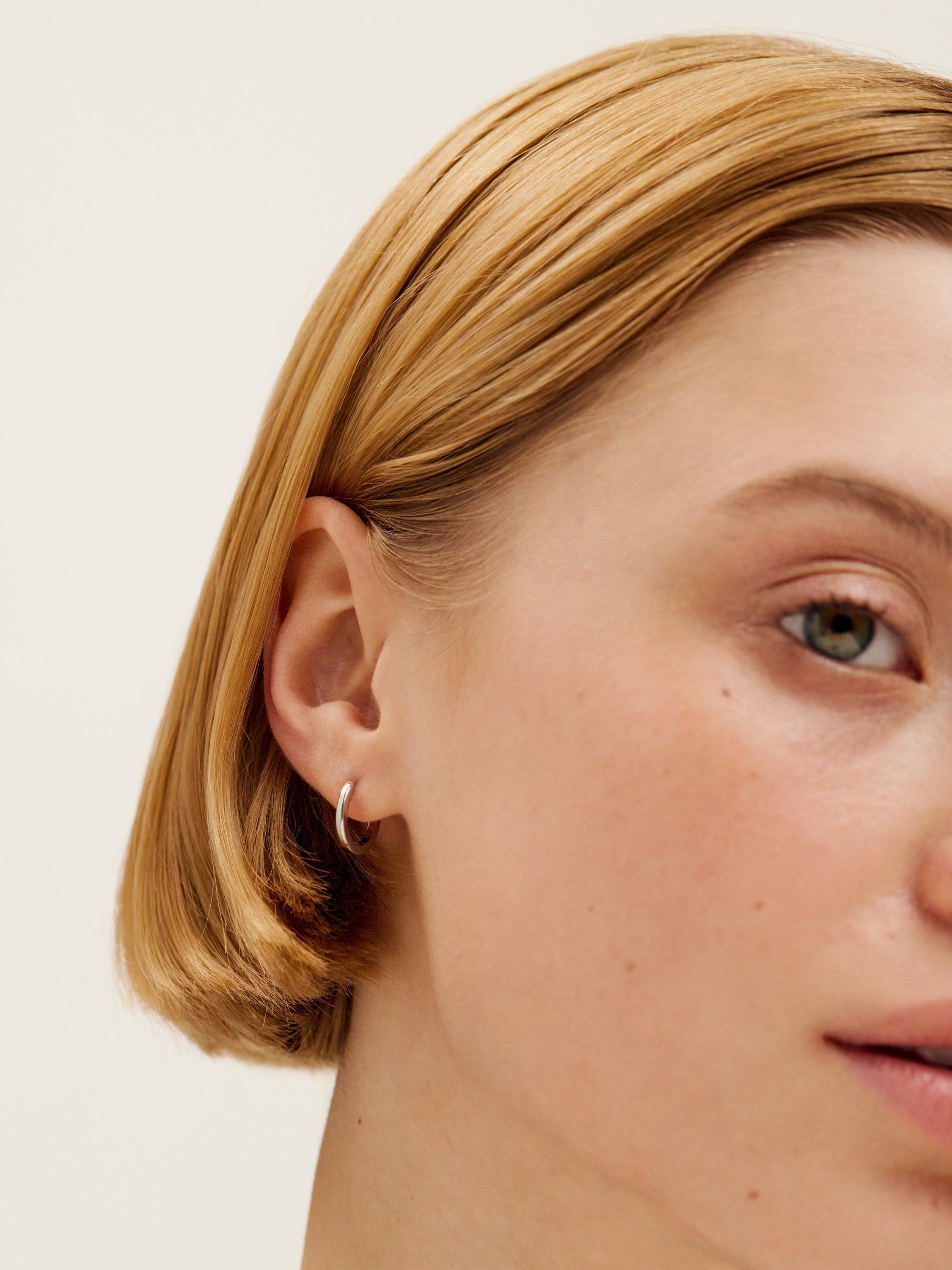 Product image 3 of 5, which shows Ted Baker Crisele 14mm Logo Hoop Earrings, Silver