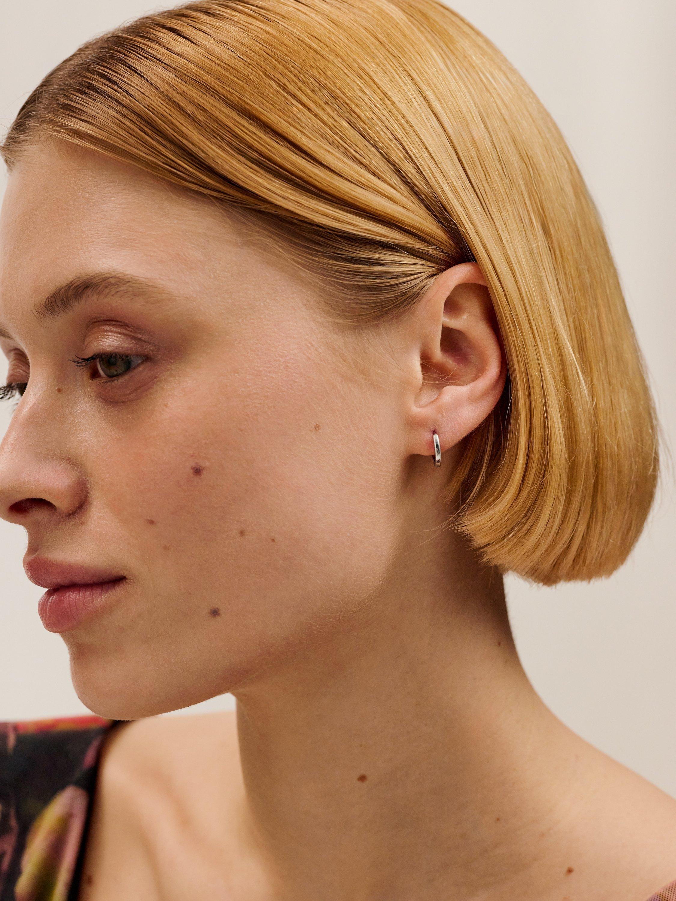 Product image 3 of 5, which shows Ted Baker Crislie 12mm Logo Hoop Earrings, Silver