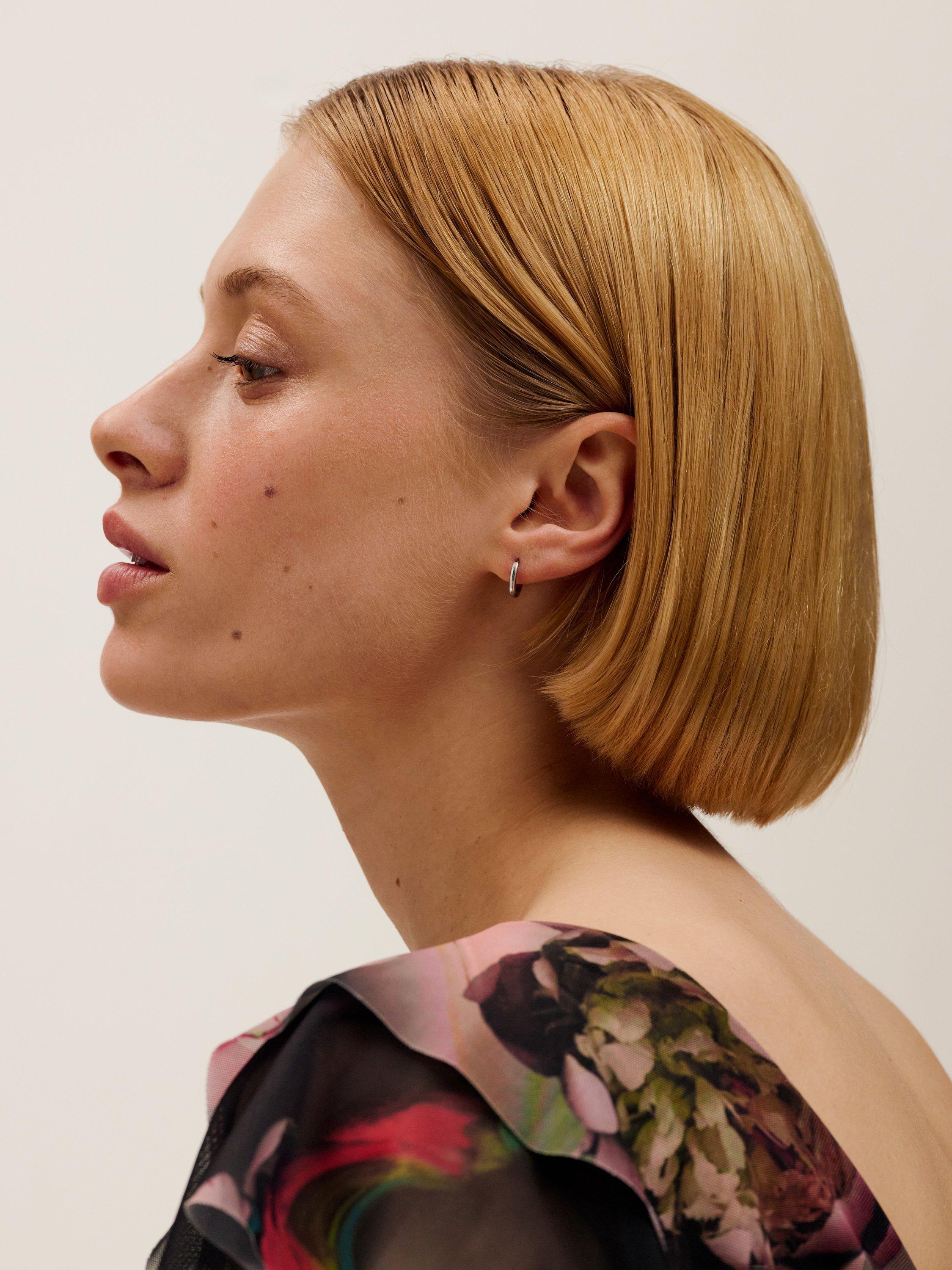 Product image 5 of 5, which shows Ted Baker Crislie 12mm Logo Hoop Earrings, Silver