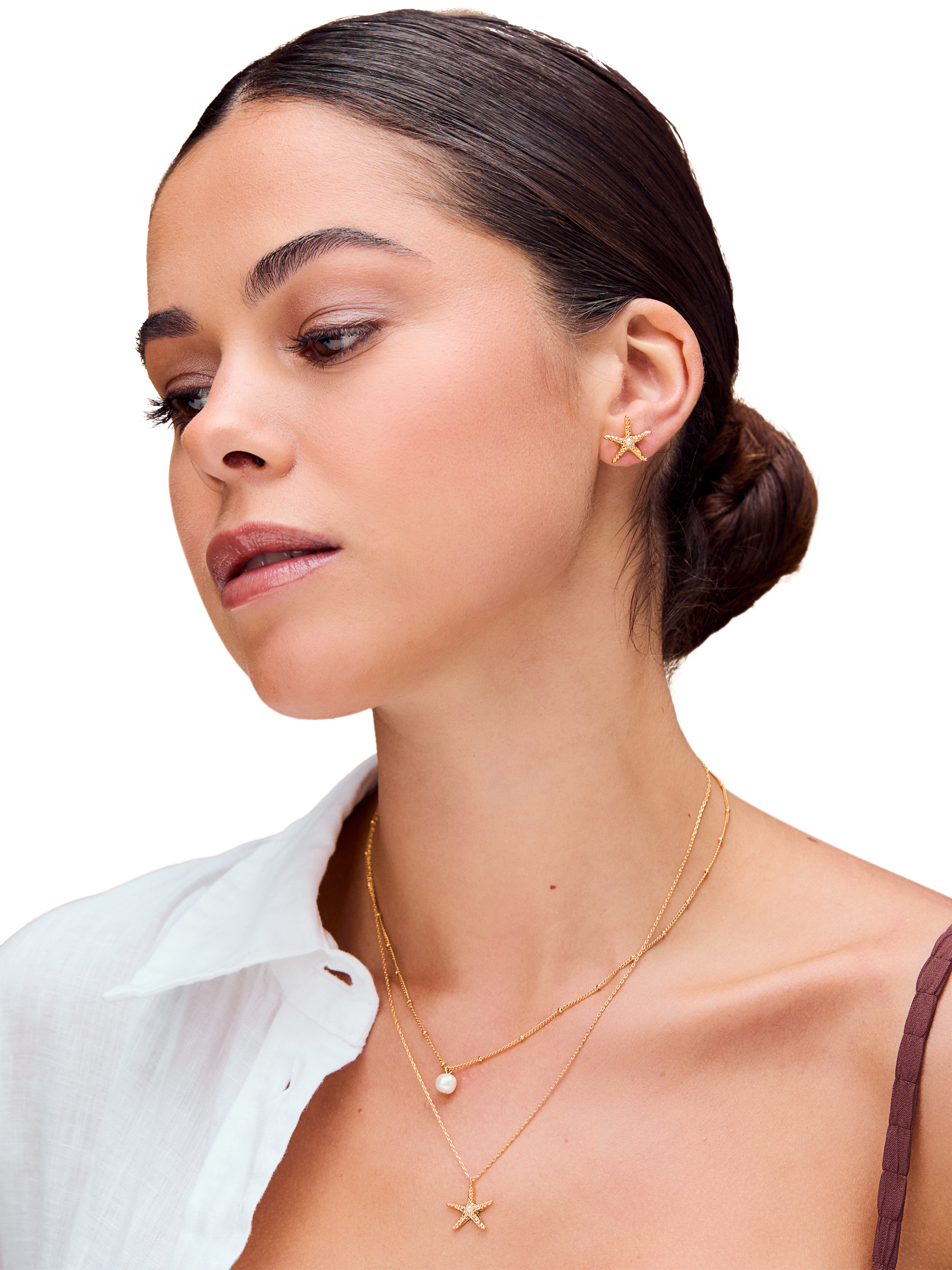 Product image 2 of 3, which shows Orelia Starfish and Pearl Stud Earrings, Gold
