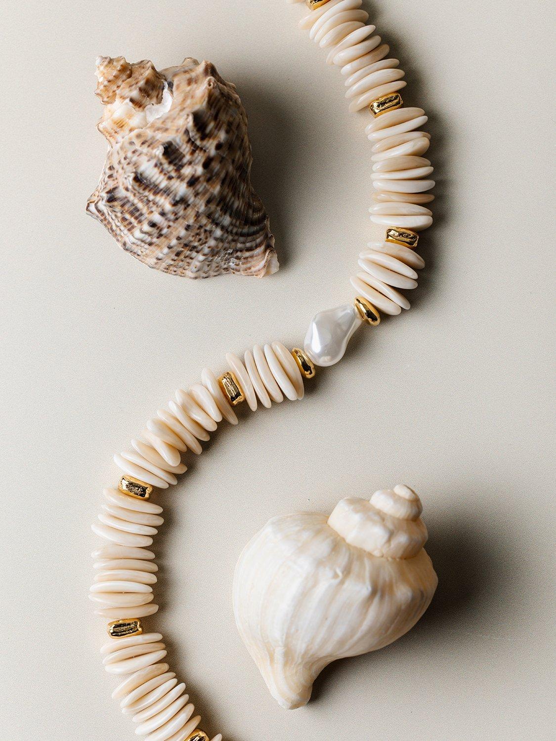 Product image 5 of 5, which shows Orelia Statement Pearl Chip Necklace, Gold