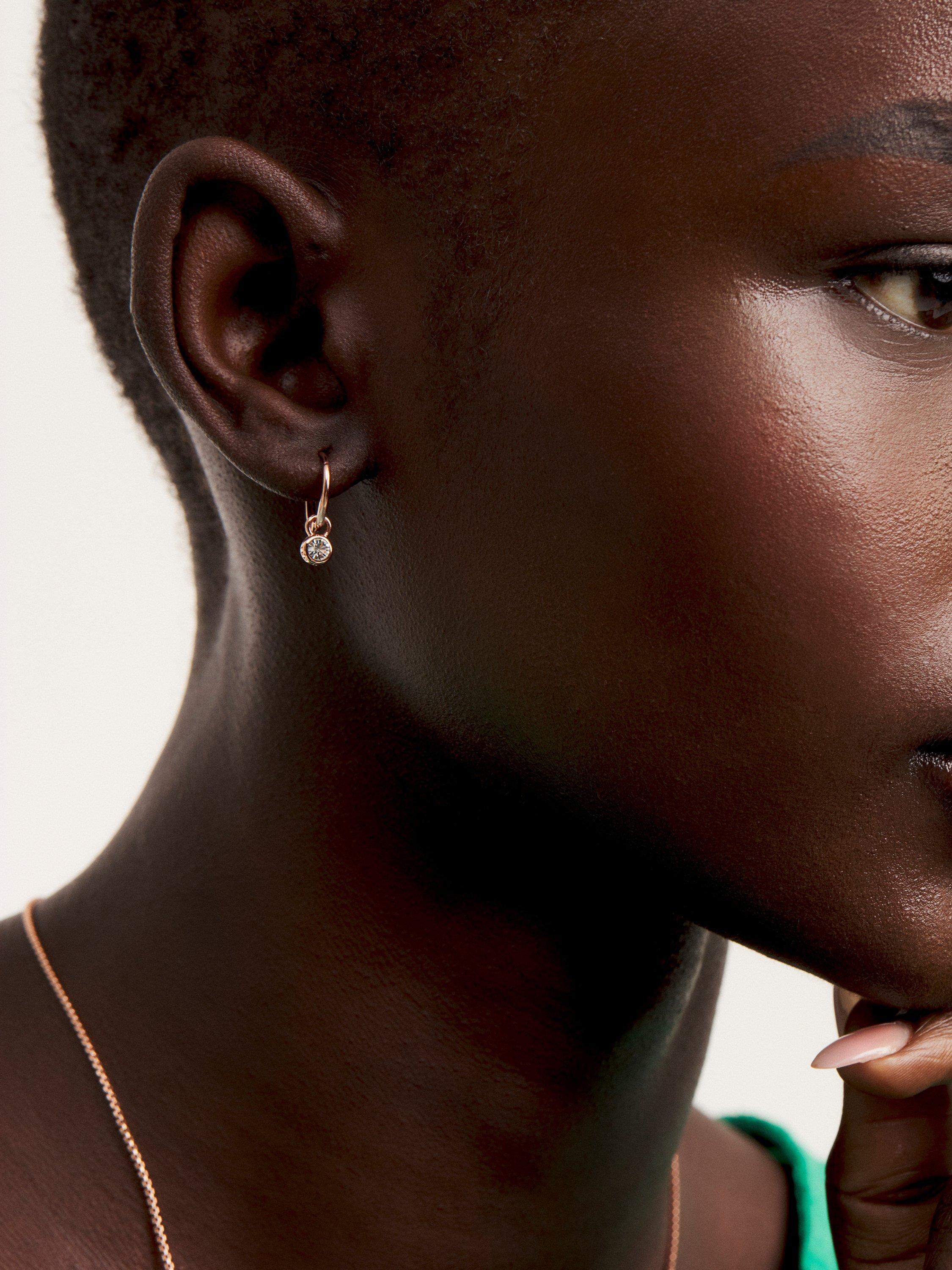 Product image 2 of 4, which shows Ted Baker Sinalaa Crystal Huggie Earrings, Rose Gold