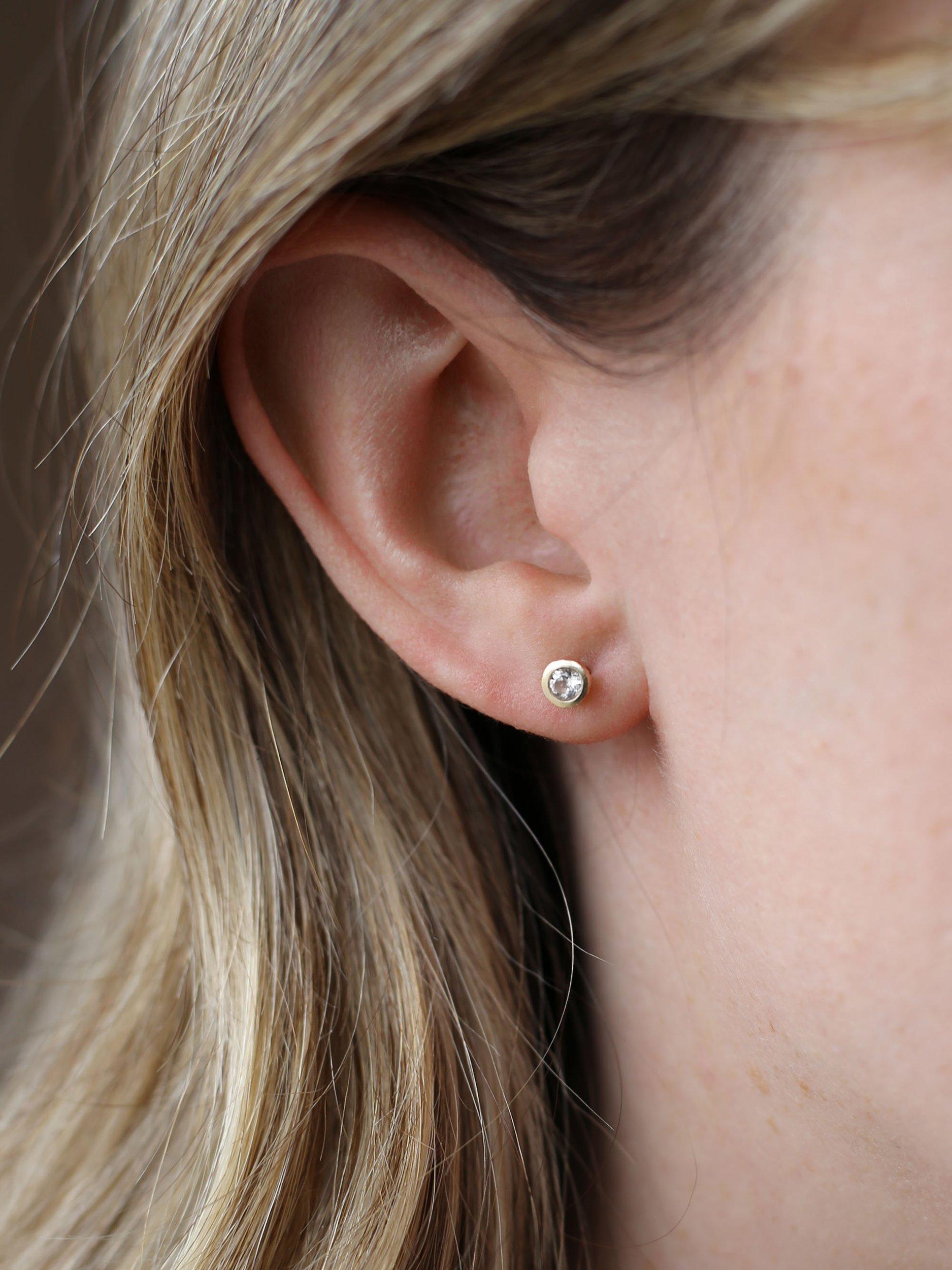 Product image 2 of 3, which shows Tutti & Co Birthstone Stud Earrings, Gold, White Topaz, April