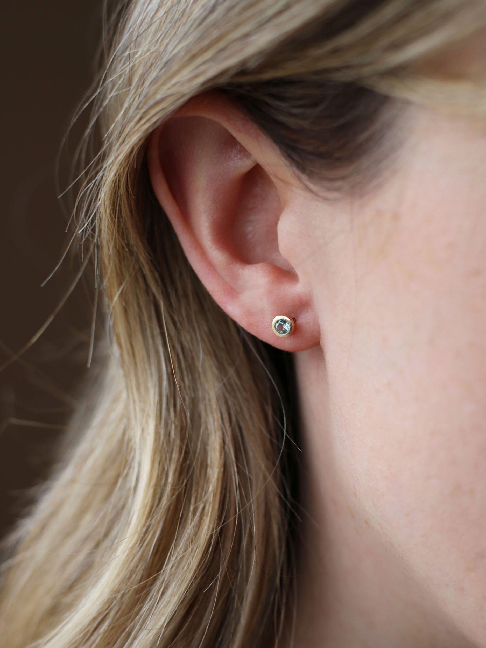 Product image 2 of 3, which shows Tutti & Co Birthstone Stud Earrings, Gold, Blue Topaz/December