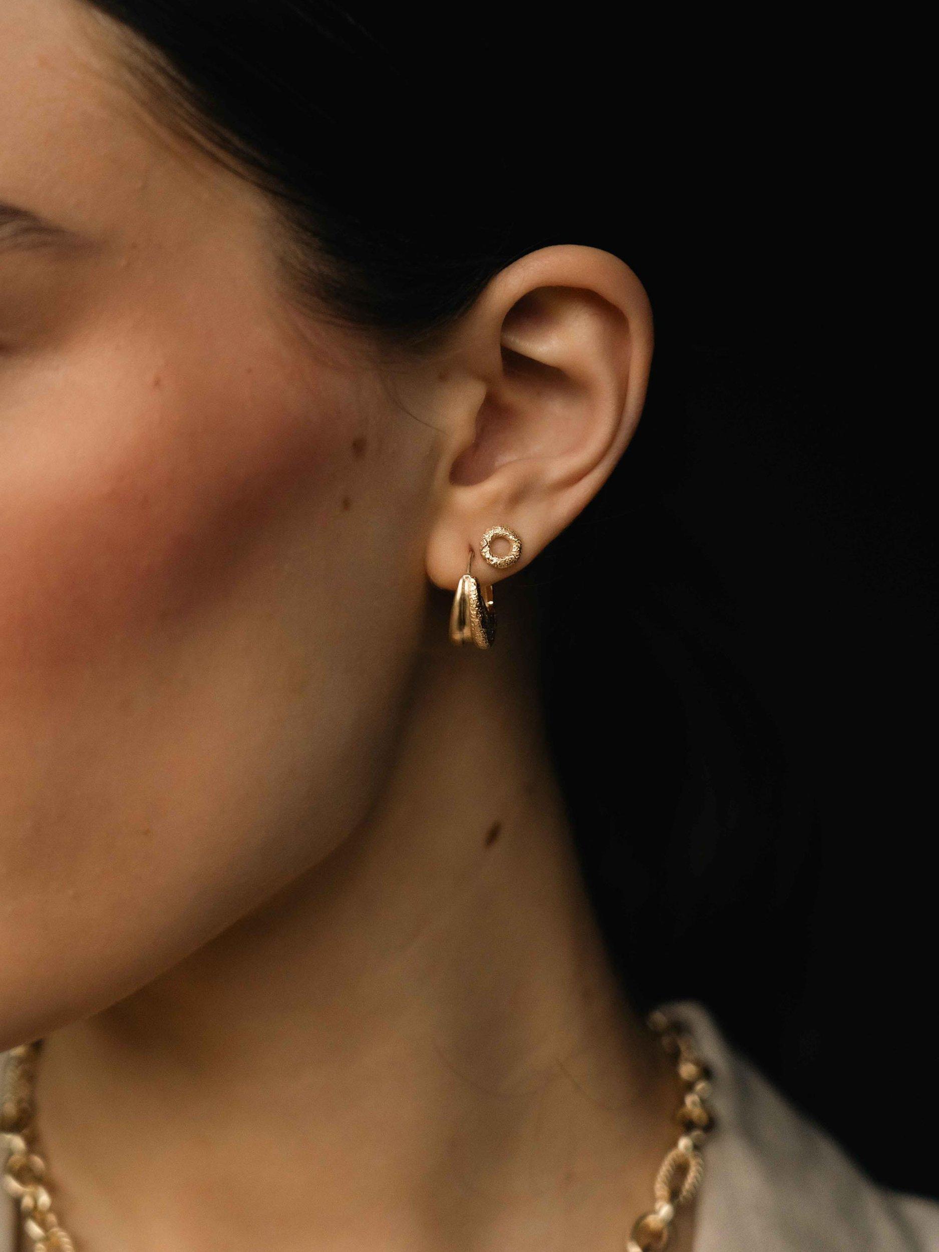 Product image 2 of 3, which shows Tutti & Co Chunky Textured Hoop Earrings, Gold