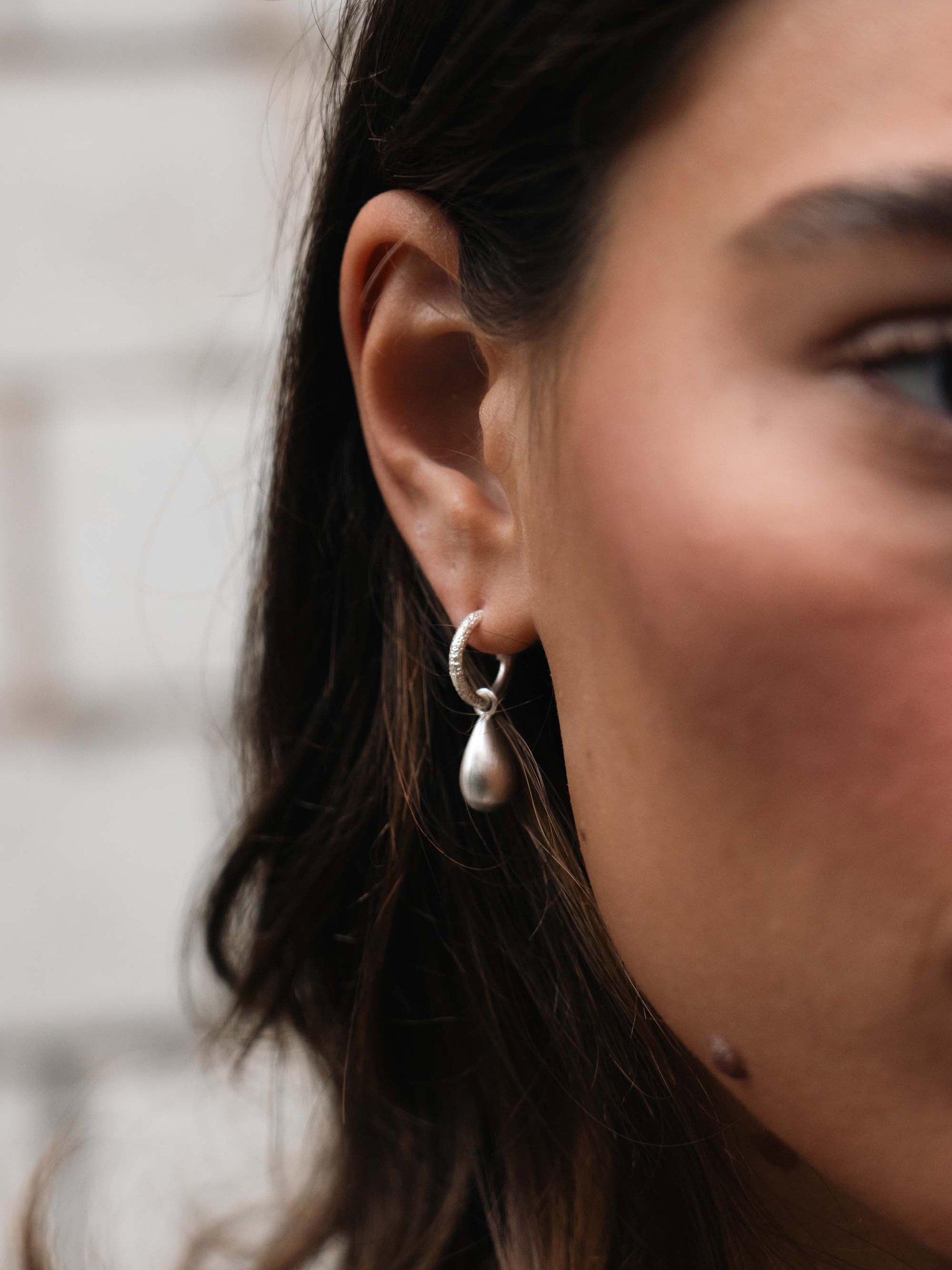 Product image 2 of 3, which shows Tutti & Co Cubic Brushed Finish Dome Drop Hoop Earrings, Silver