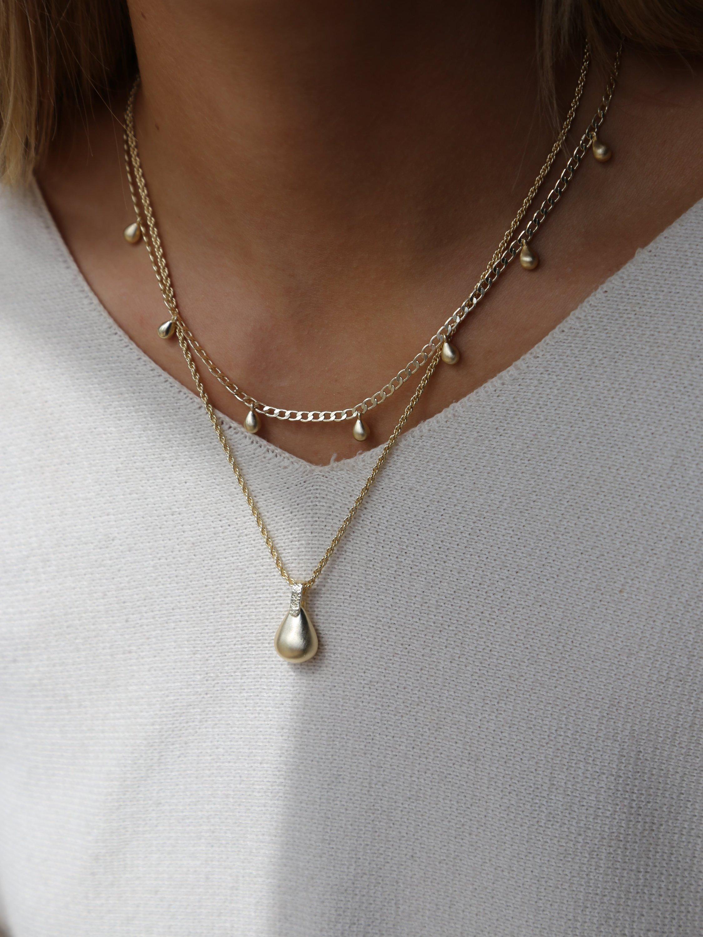 Product image 2 of 3, which shows Tutti & Co Brushed Finish Teardrop Pendant Necklace, Gold