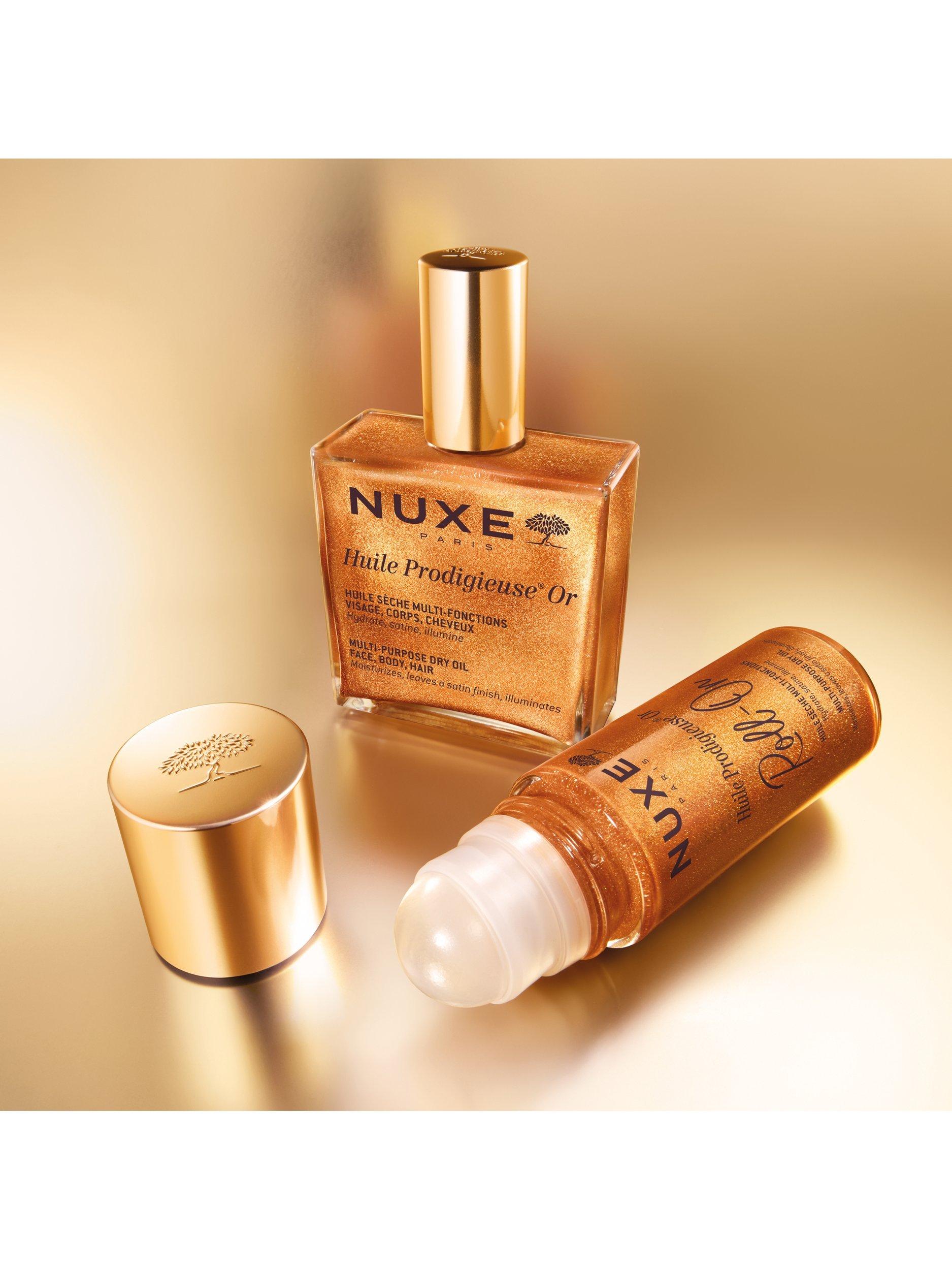 Product image 7 of 9, which shows NUXE Roll-On Huile Prodigieuse® Multi-Purpose Dry Oil for Face, Body and Hair Shimmer, 60ml
