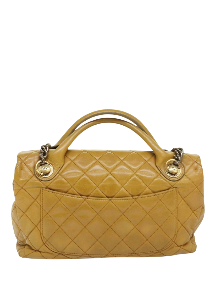 Product image 3 of 10, which shows Pre-loved CHANEL 2013 Castle Rock Lambskin Shoulder Bag, Mustard