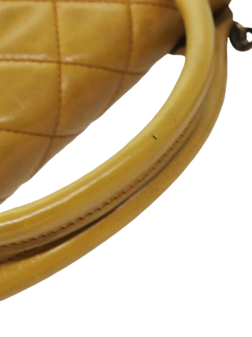 Product image 7 of 10, which shows Pre-loved CHANEL 2013 Castle Rock Lambskin Shoulder Bag, Mustard
