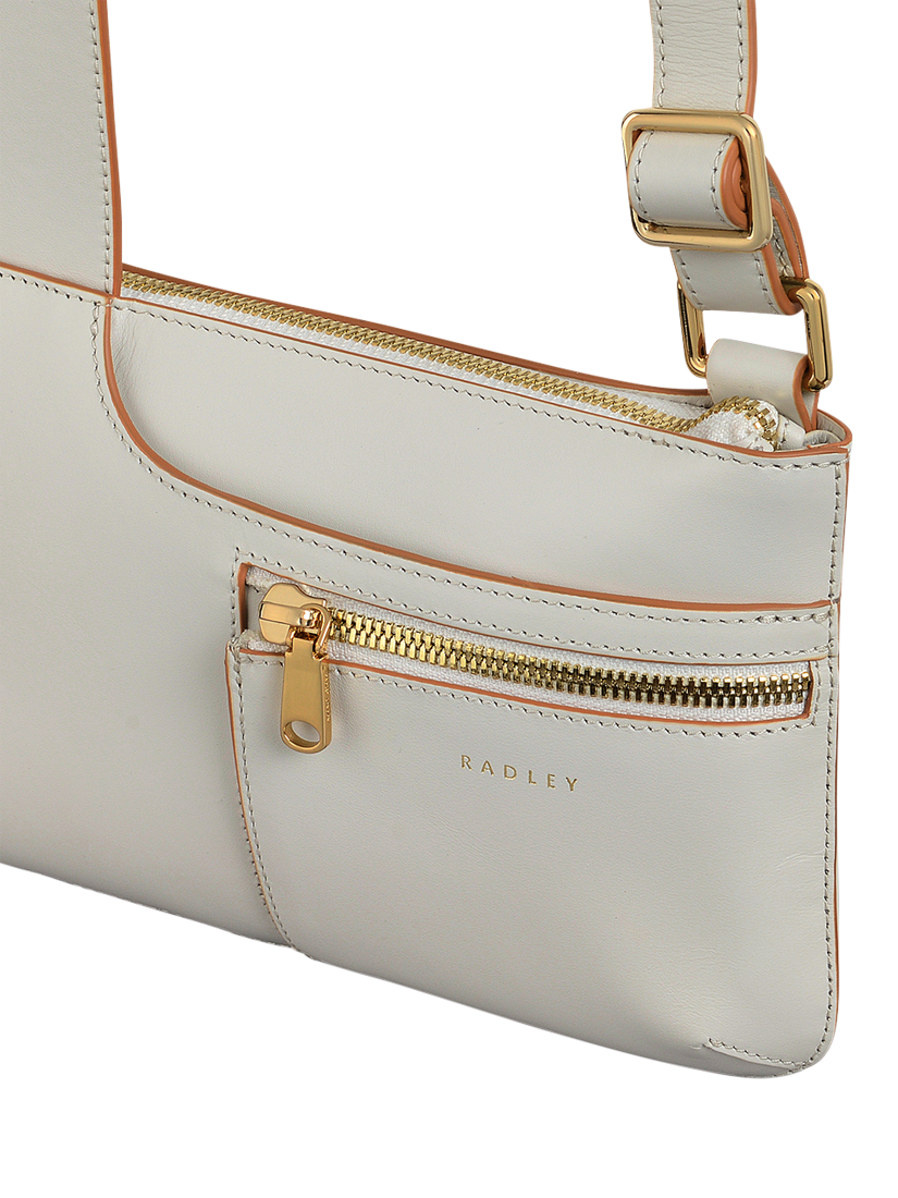 Product image 4 of 5, which shows Radley Pockets Leather Mini Zip Top Cross Body Bag, Chalk