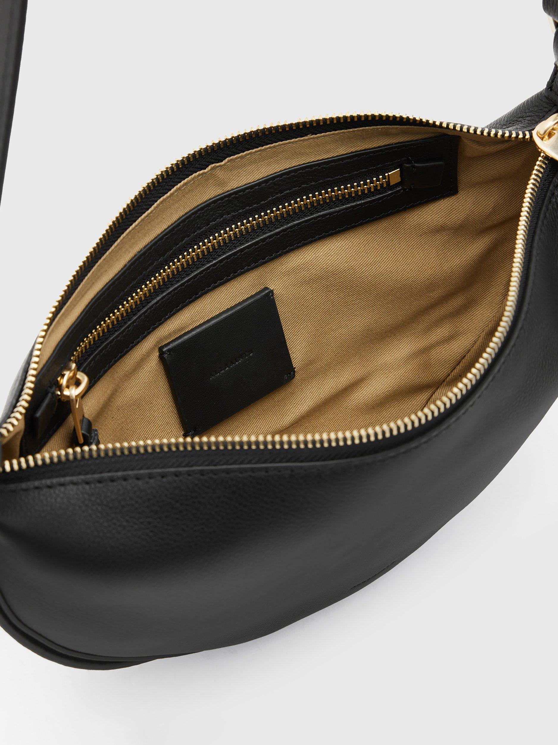 Product image 3 of 7, which shows AllSaints Half Moon Cross Body Bag, Black