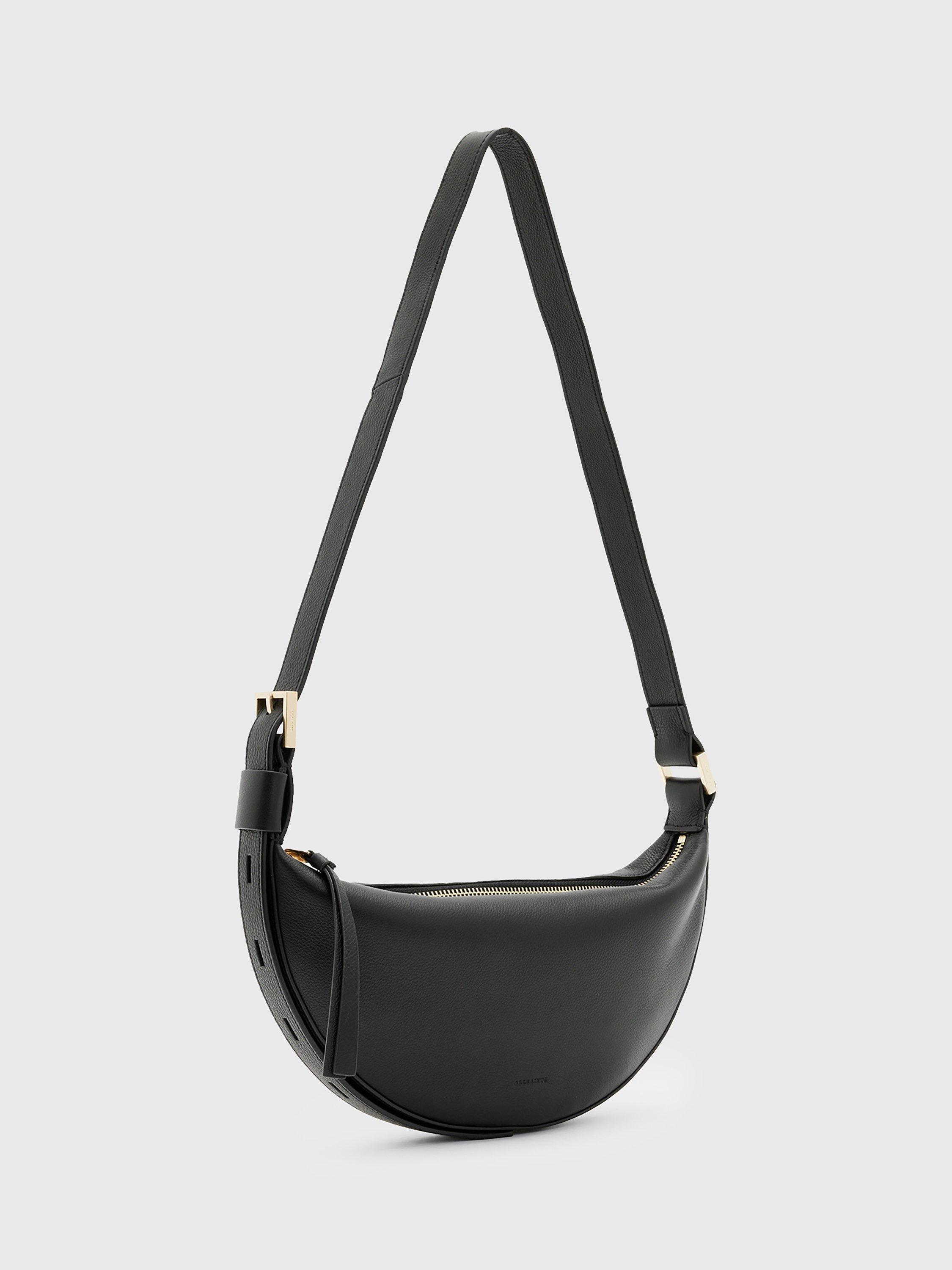 Product image 4 of 7, which shows AllSaints Half Moon Cross Body Bag, Black