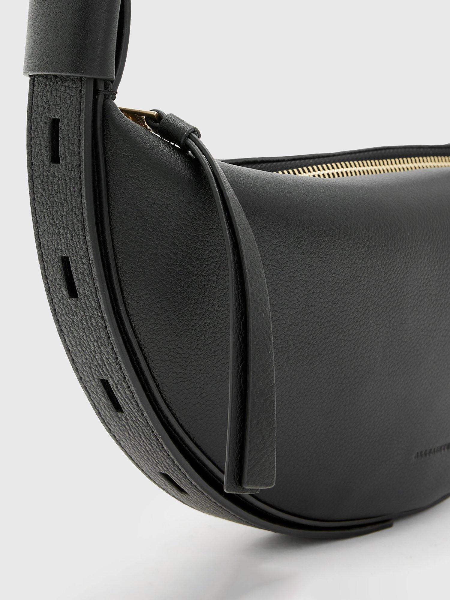 Product image 5 of 7, which shows AllSaints Half Moon Cross Body Bag, Black