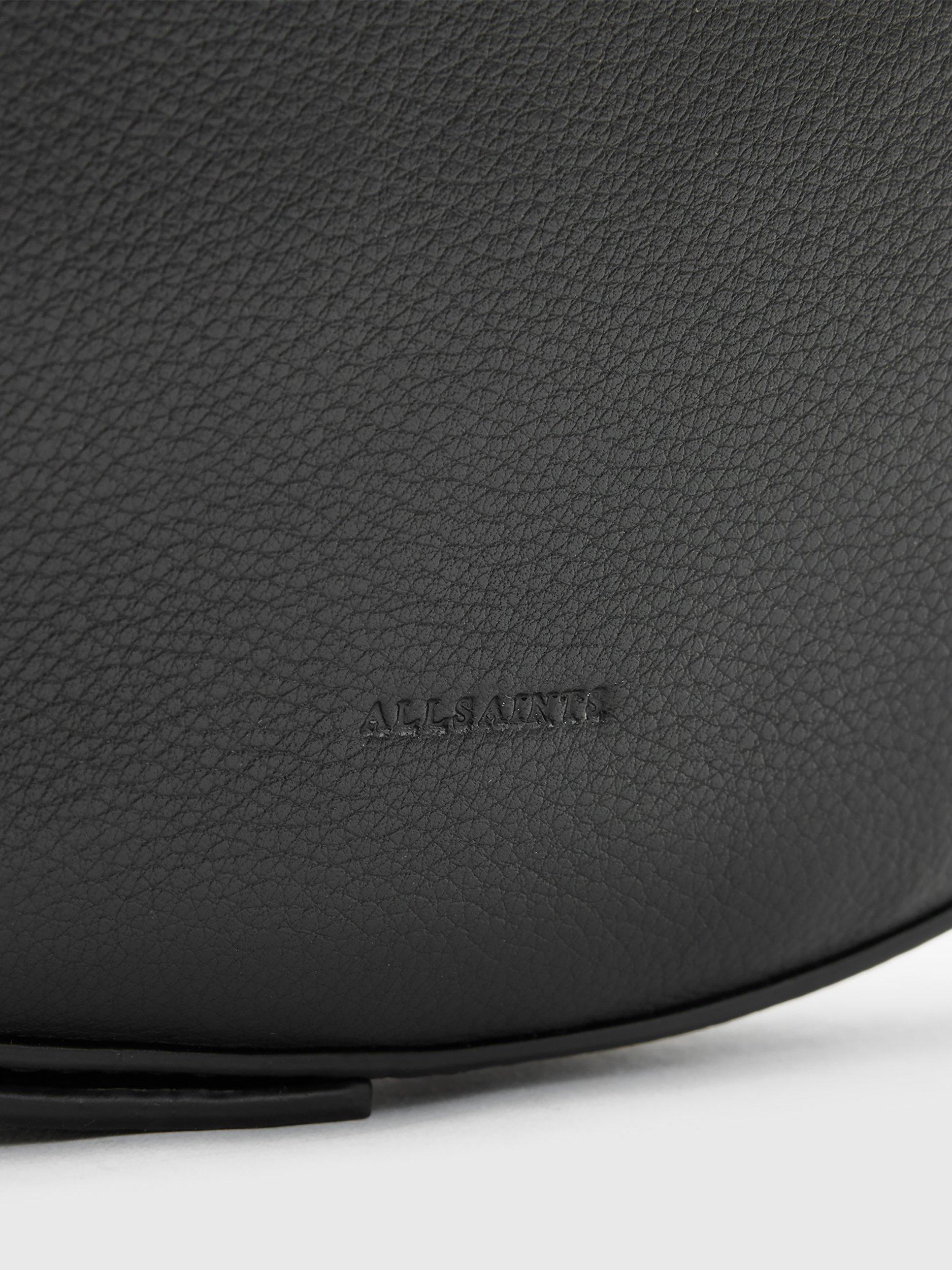 Product image 6 of 7, which shows AllSaints Half Moon Cross Body Bag, Black