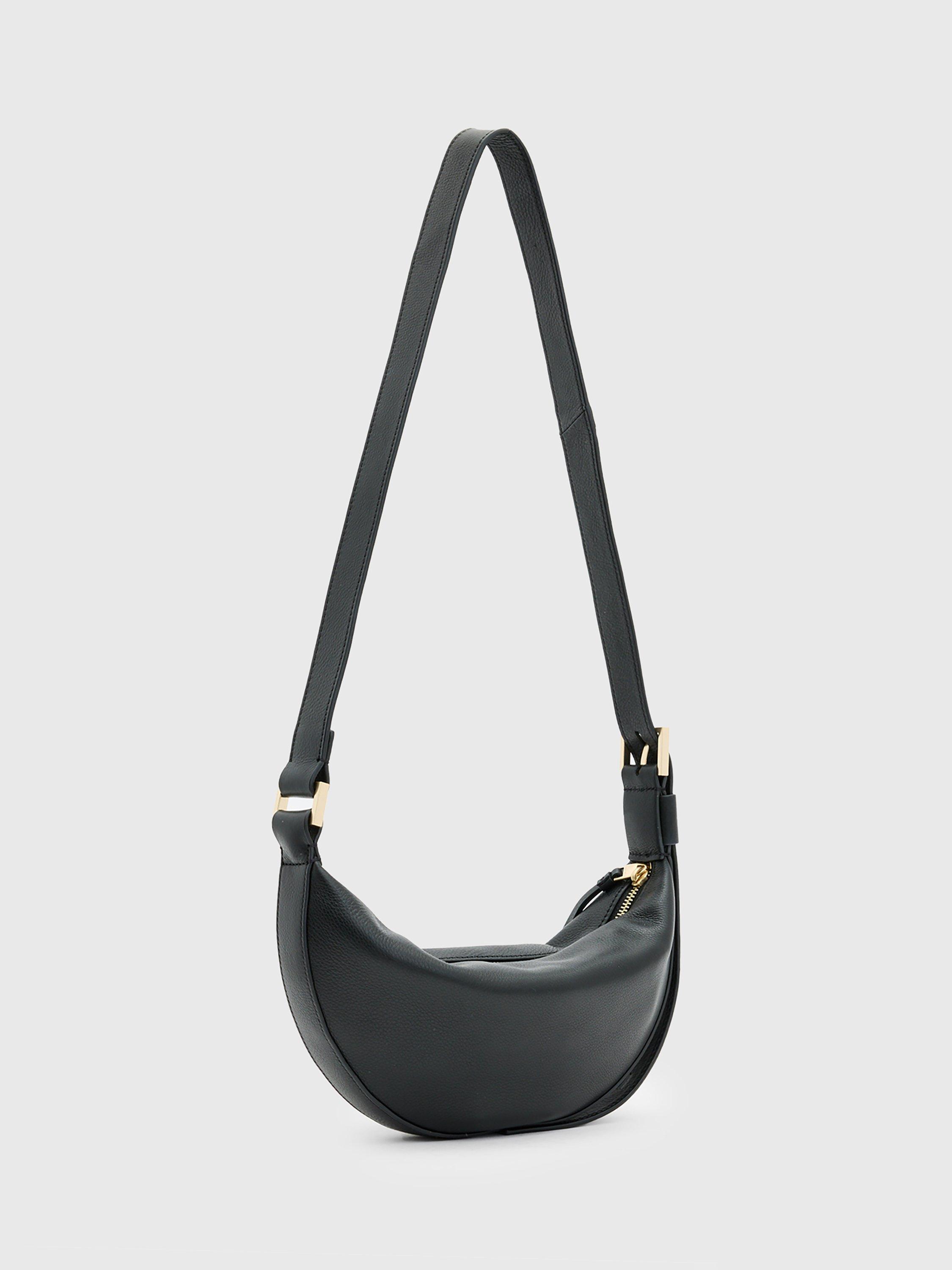 Product image 7 of 7, which shows AllSaints Half Moon Cross Body Bag, Black