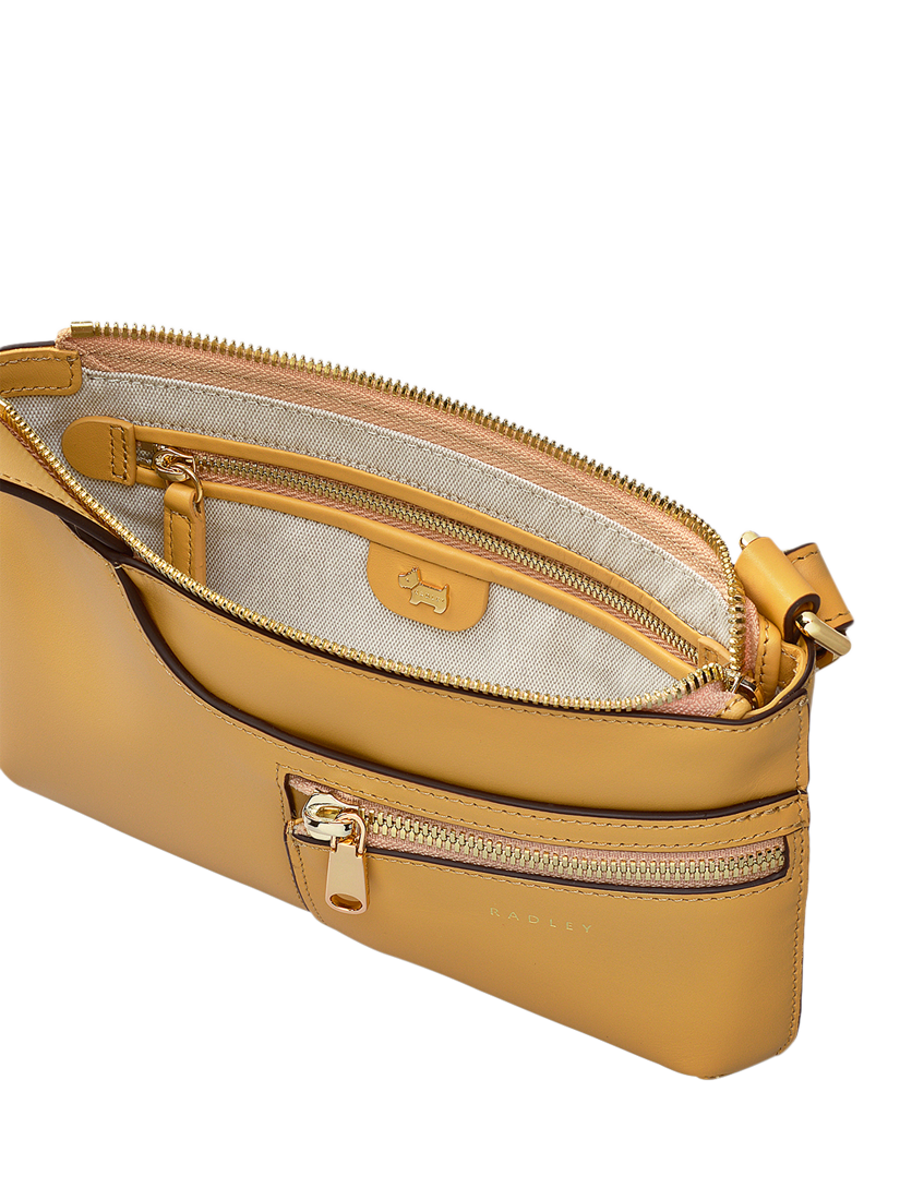 Product image 3 of 5, which shows Radley Pockets Leather Mini Zip Top Cross Body Bag, Pecan