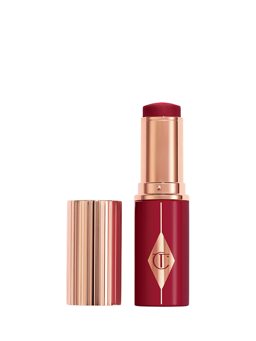 Product image 1 of 8, which shows Charlotte Tilbury Unreal Blush Healthy Glow Stick, Berry Glow