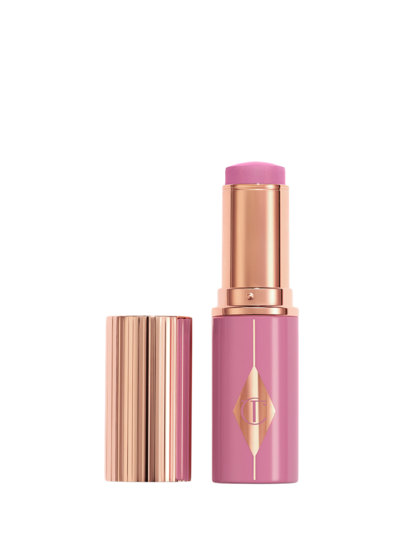 Product image 1 of 8, which shows Charlotte Tilbury Unreal Blush Healthy Glow Stick, Pretty Glow