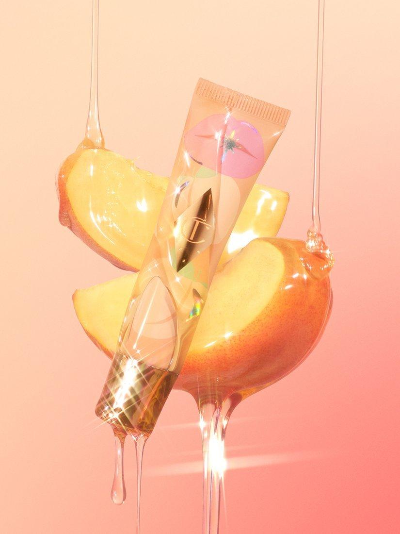 Product image 6 of 7, which shows Charlotte Tilbury Unreal Lips Healthy Glow Nectar Oil, Juicylicious Pure Peach