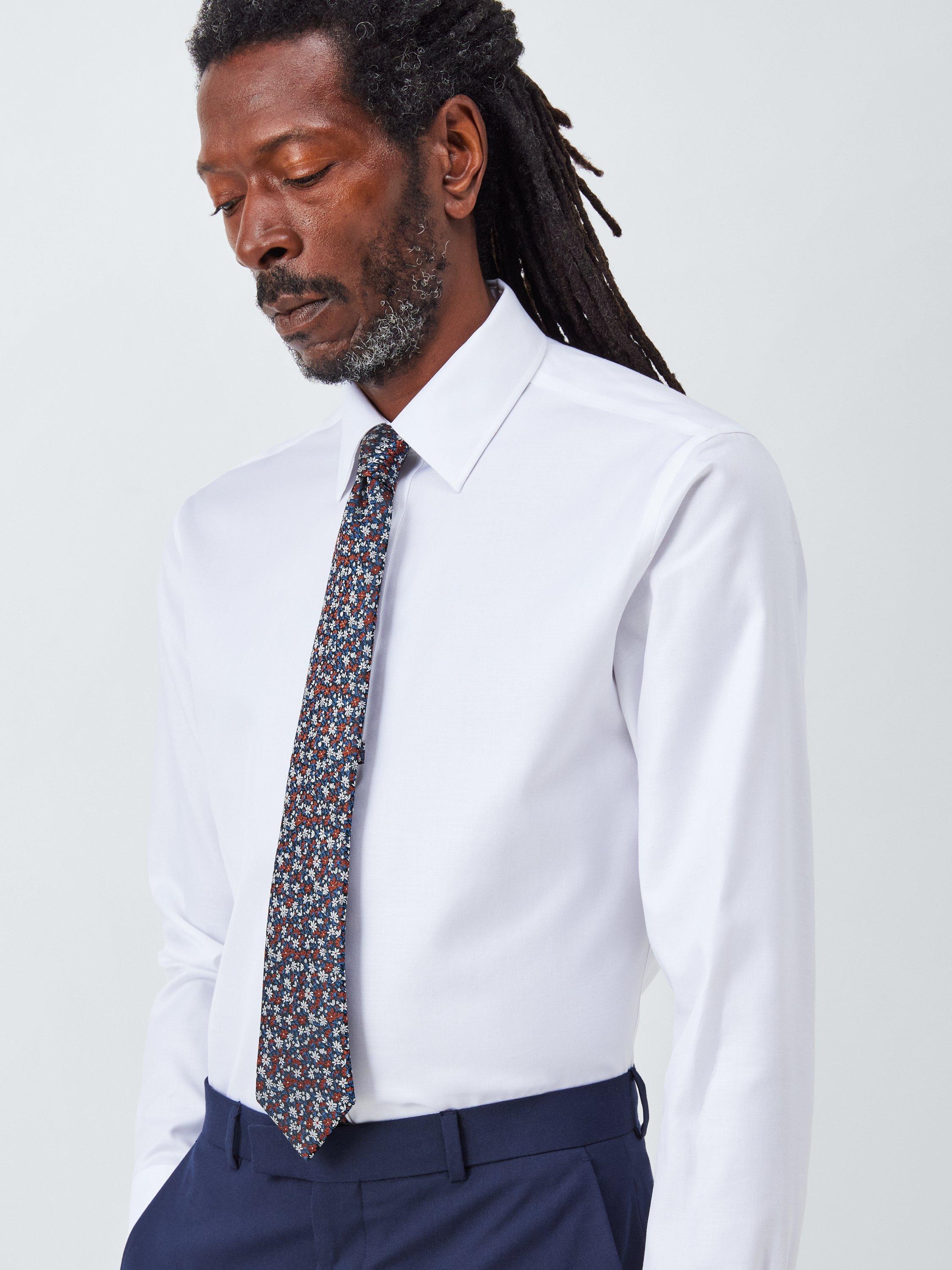 Product image 2 of 3, which shows John Lewis Ditsy Floral Silk Tie, Navy/Orange